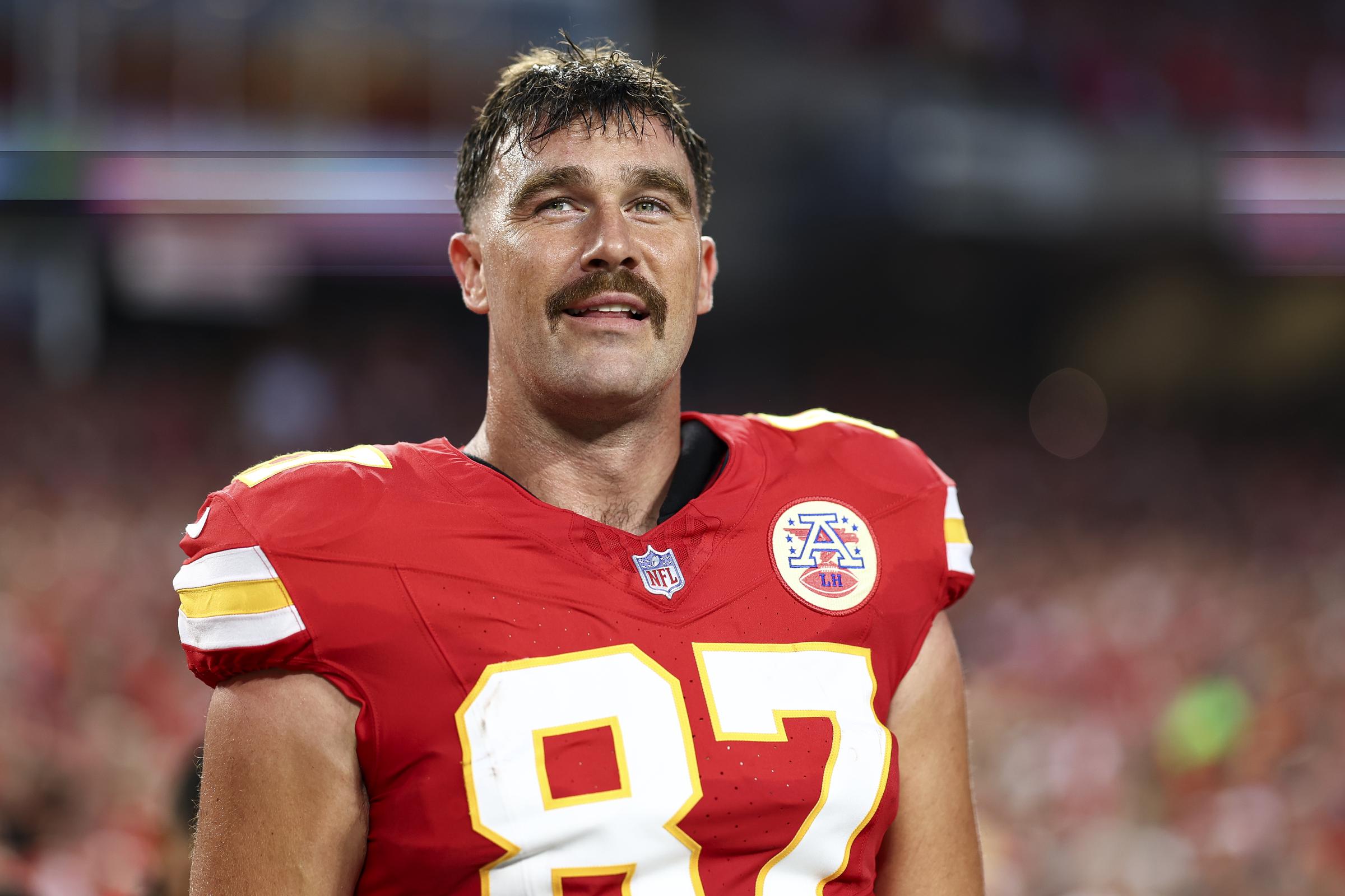 Travis Kelce smiles on the sidelines before facing the Ravens at GEHA Field, Kansas City, on September 5, 2024 | Source: Getty Images