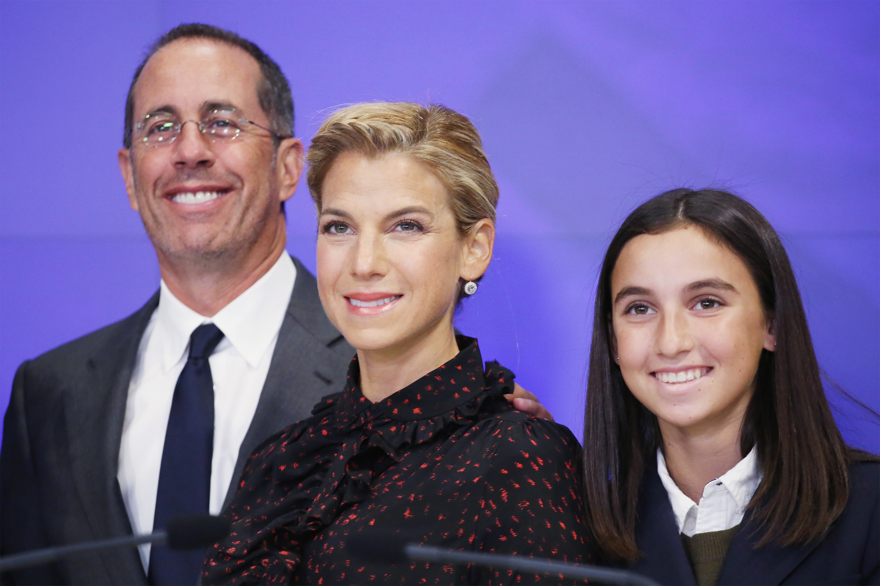 Jerry Seinfeld, his wife Jessica Seinfeld and their daughter Sascha Seinfeld ringing the opening bell at NASDAQ on April 14, 2016, in New York City. | Source: Getty Images