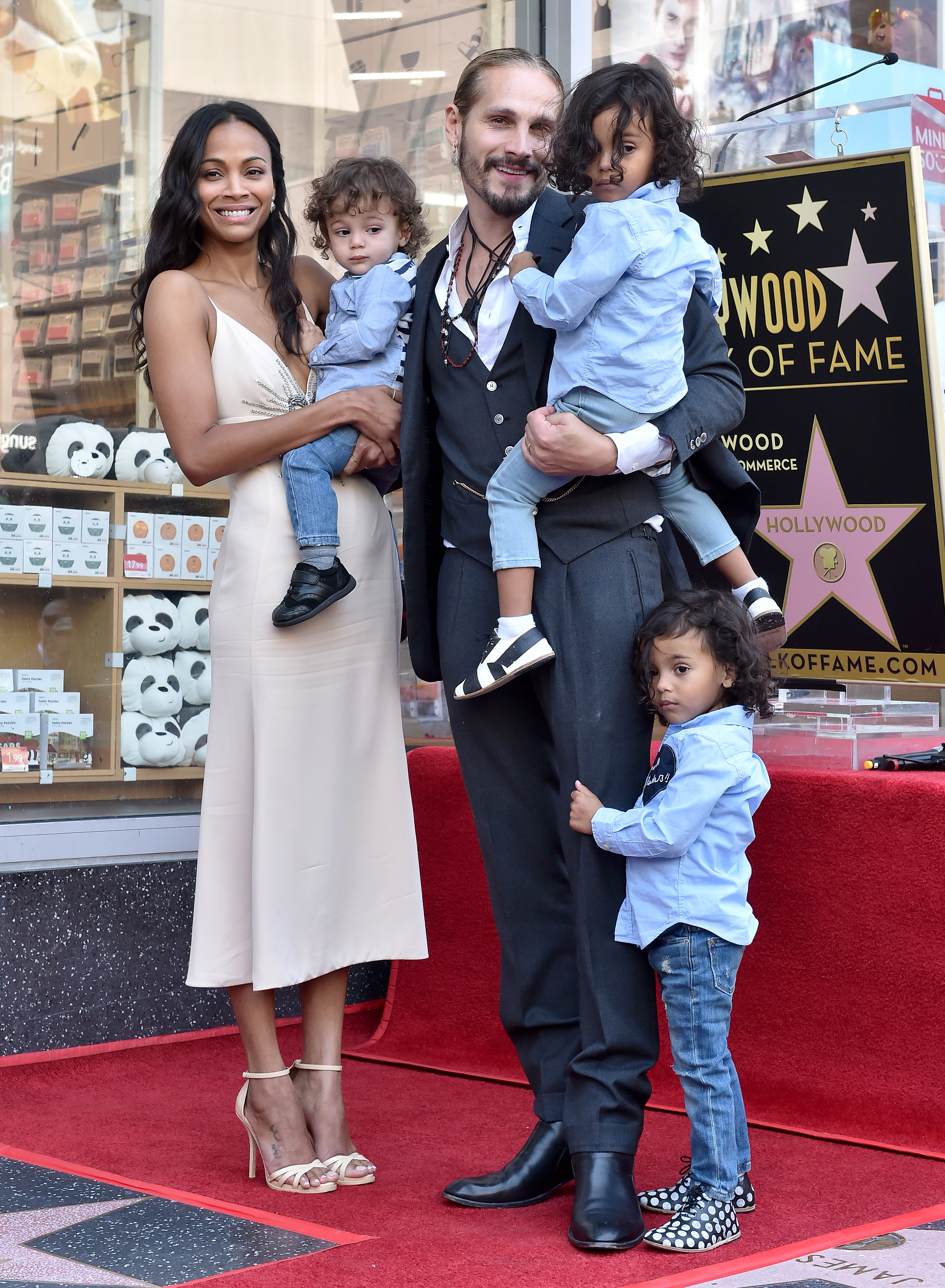 Zoe Saldaña and her family look beautiful in their outfits as their sons sport the same blue shirt and jeans trousers at the Hollywood Walk of Fame ceremony.