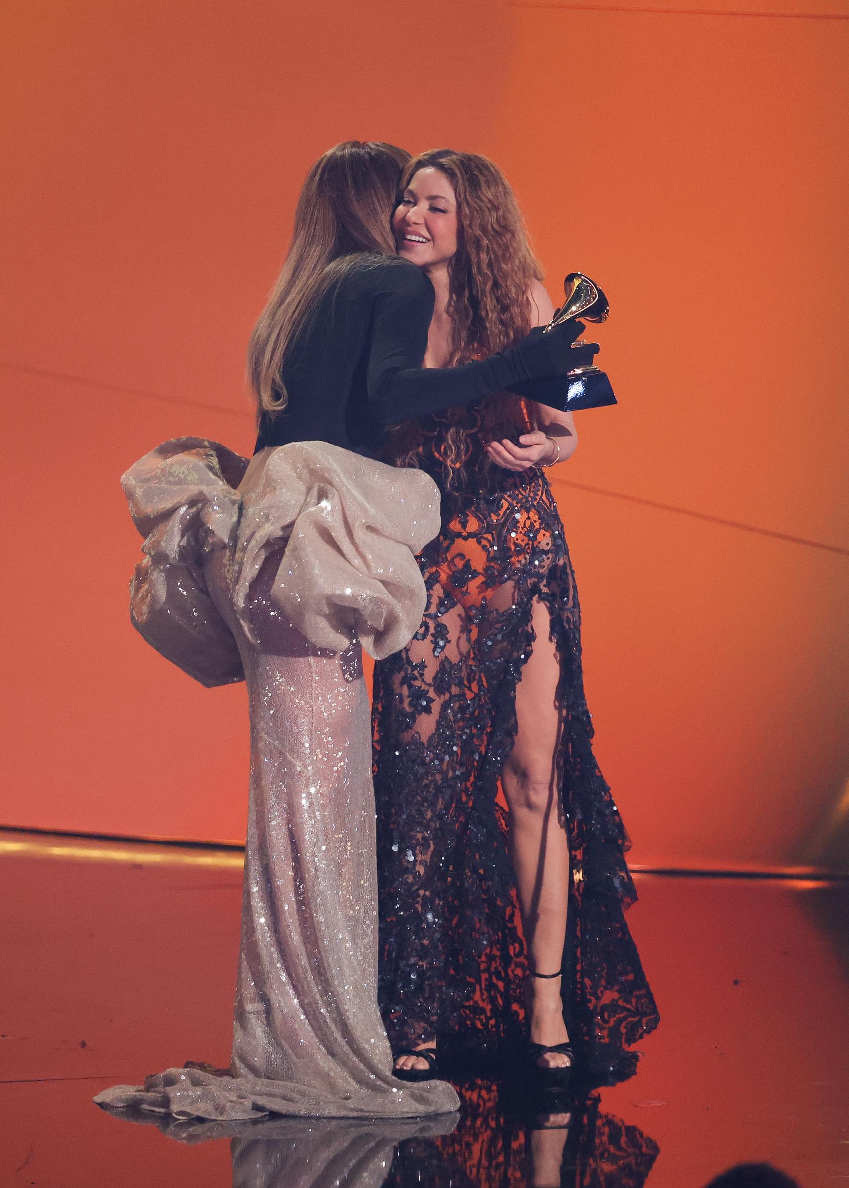 Jennifer Lopez presents the Best Latin Pop Album award for "Las Mujeres Ya No Lloran" to Shakira onstage during the 67th Annual GRAMMY Awards at Crypto.com Arena on February 2, 2025, in Los Angeles, California | Source: Getty Images