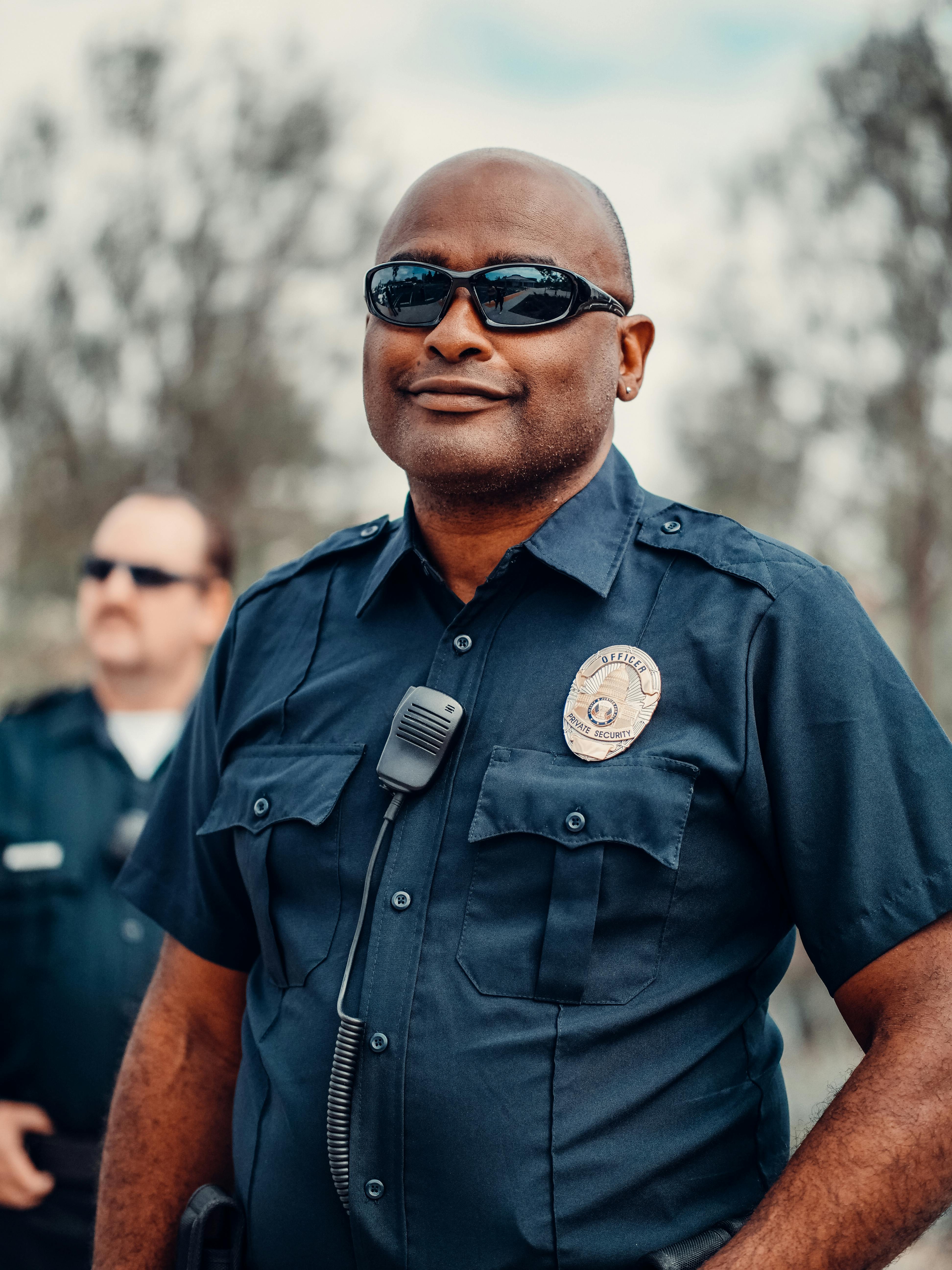 A police officer looking smug | Source: Pexels