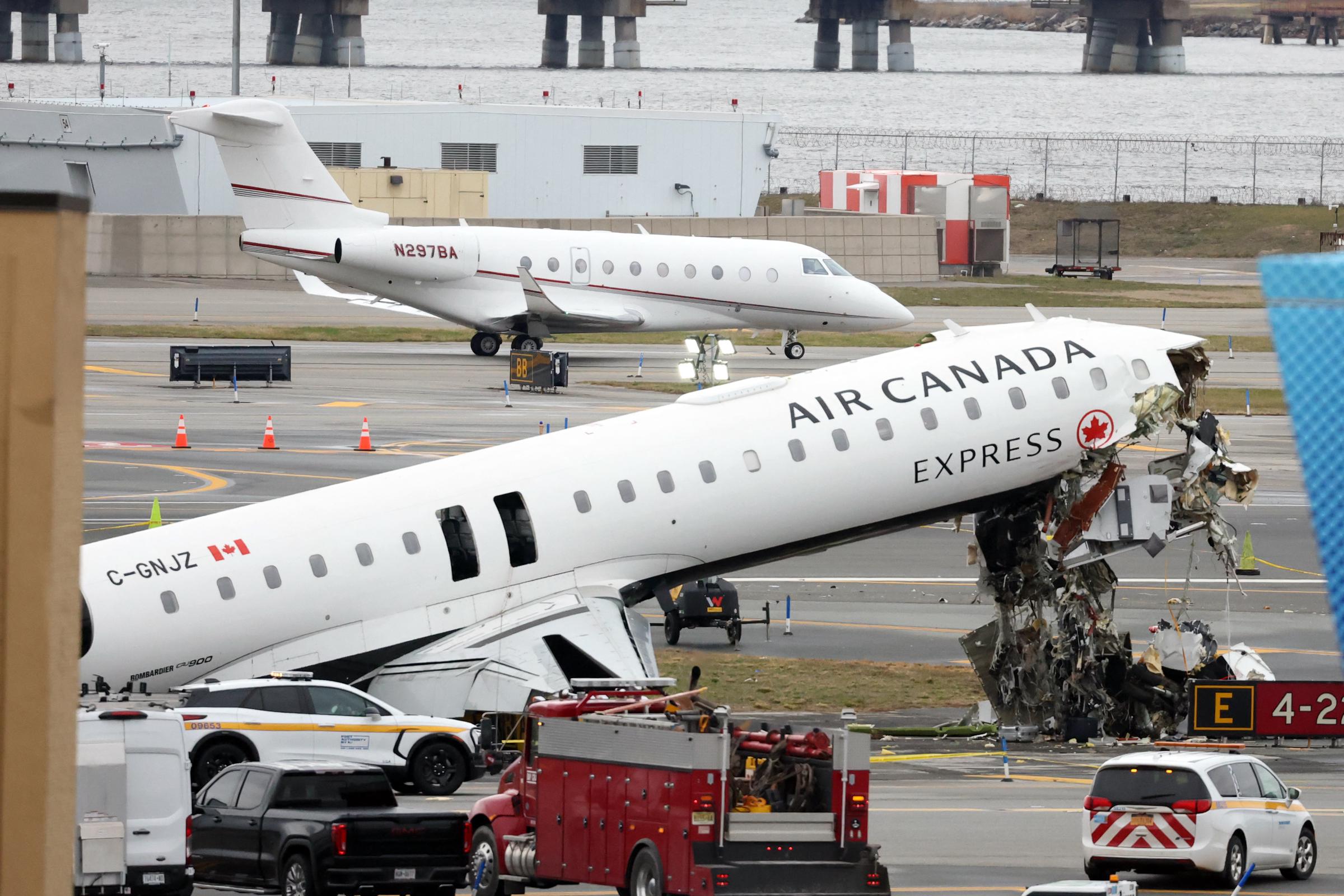 Emergency crews respond to the Air Canada Express crash at LaGuardia Airport in New York, March 23, 2026 | Source: Getty Images
