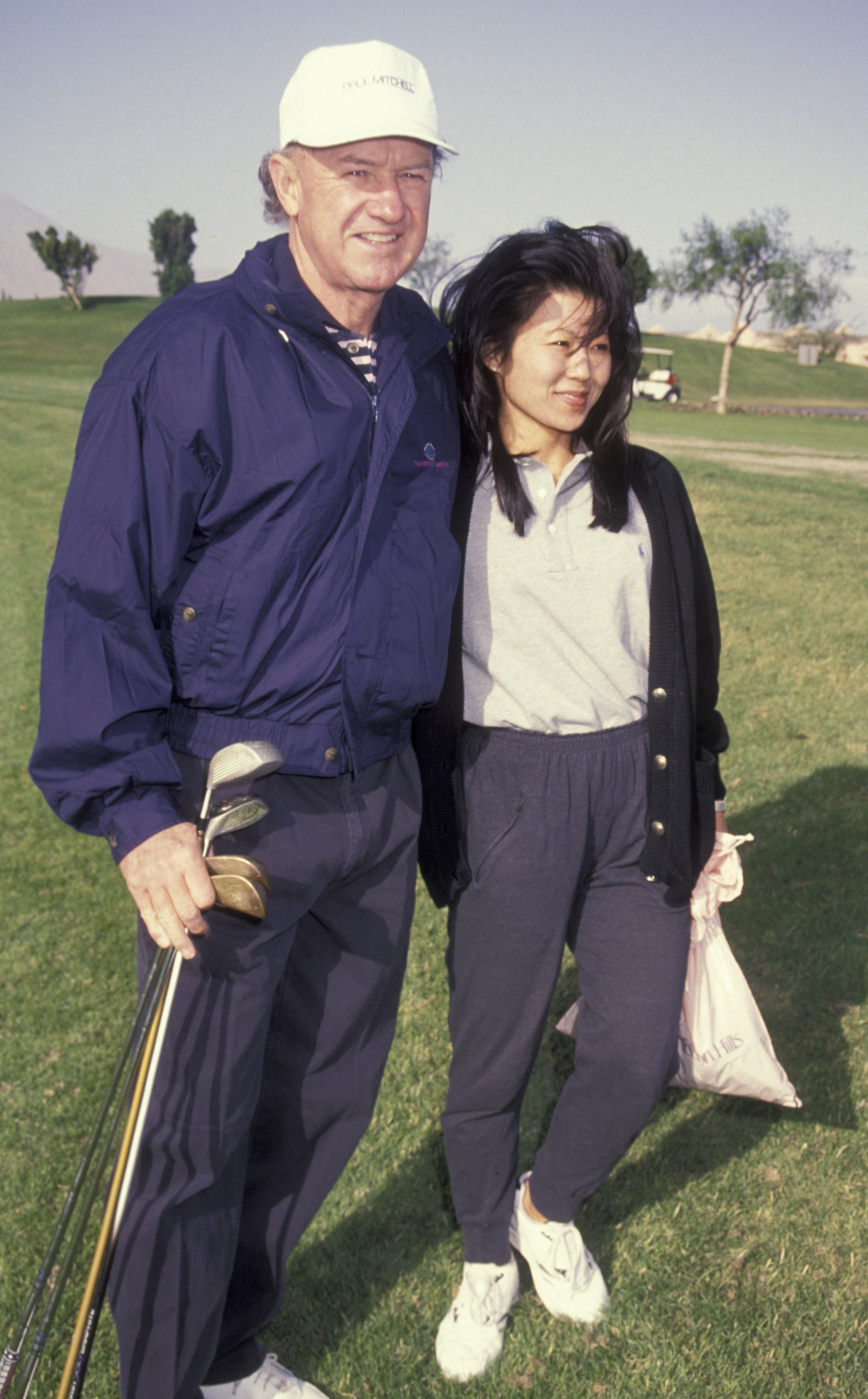 Gene Hackman and Betsy Arakawa at the Mission Hills Pro-Celebrity Sports Invitational on November 30, 1991 | Source: Getty Images