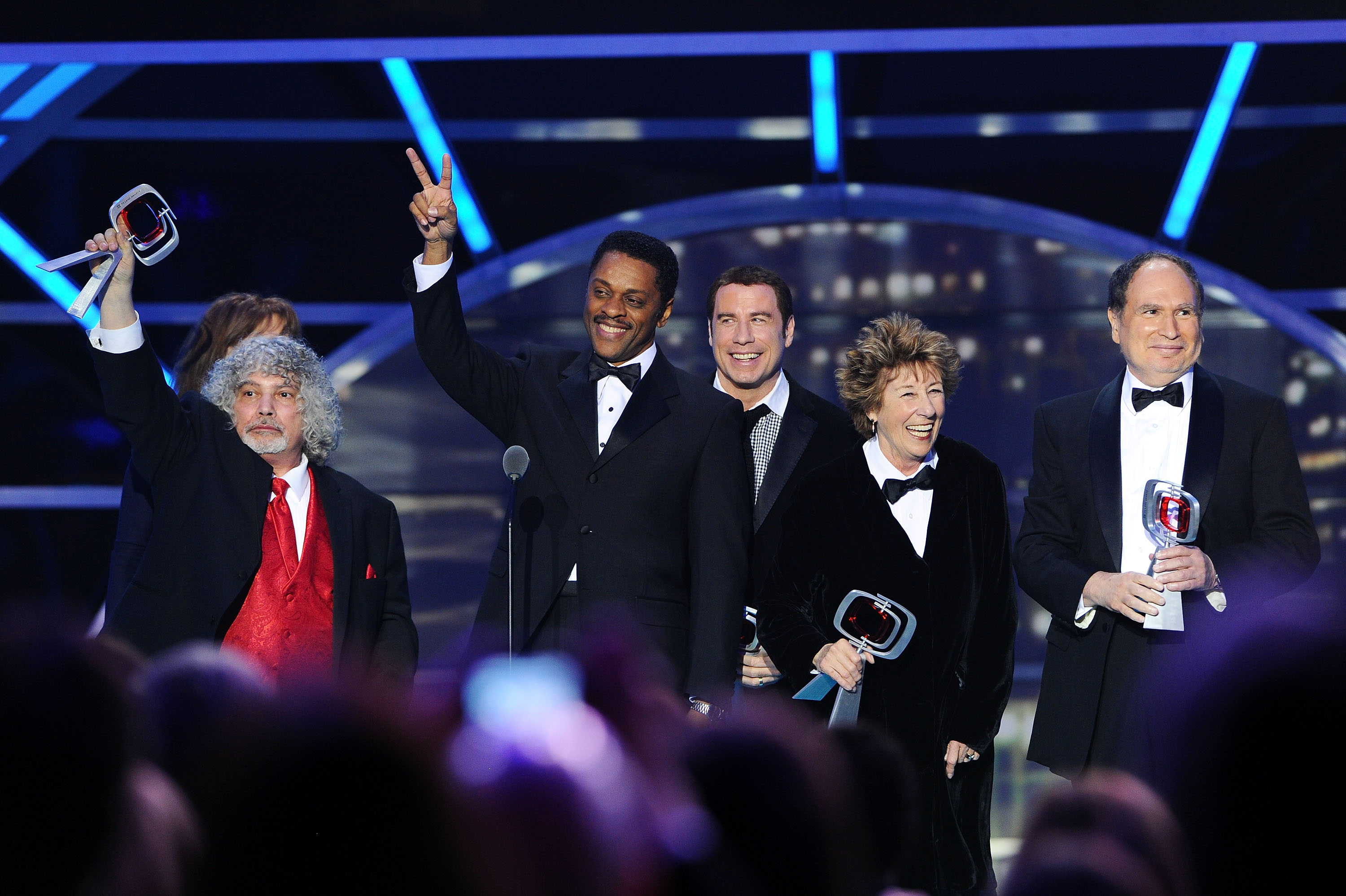 The cast and crew of "Welcome Back, Kotter" (L-R) Marcia Strassman, Robert Hegyes, Lawrence Hilton-Jacobs, John Travolta, Ellen Travolta and Gabe Kaplan. Image Credit: Getty Images