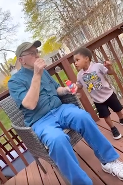 Paul Callahan with Sharaine Caraballo's child | Source: facebook.com/USA TODAY