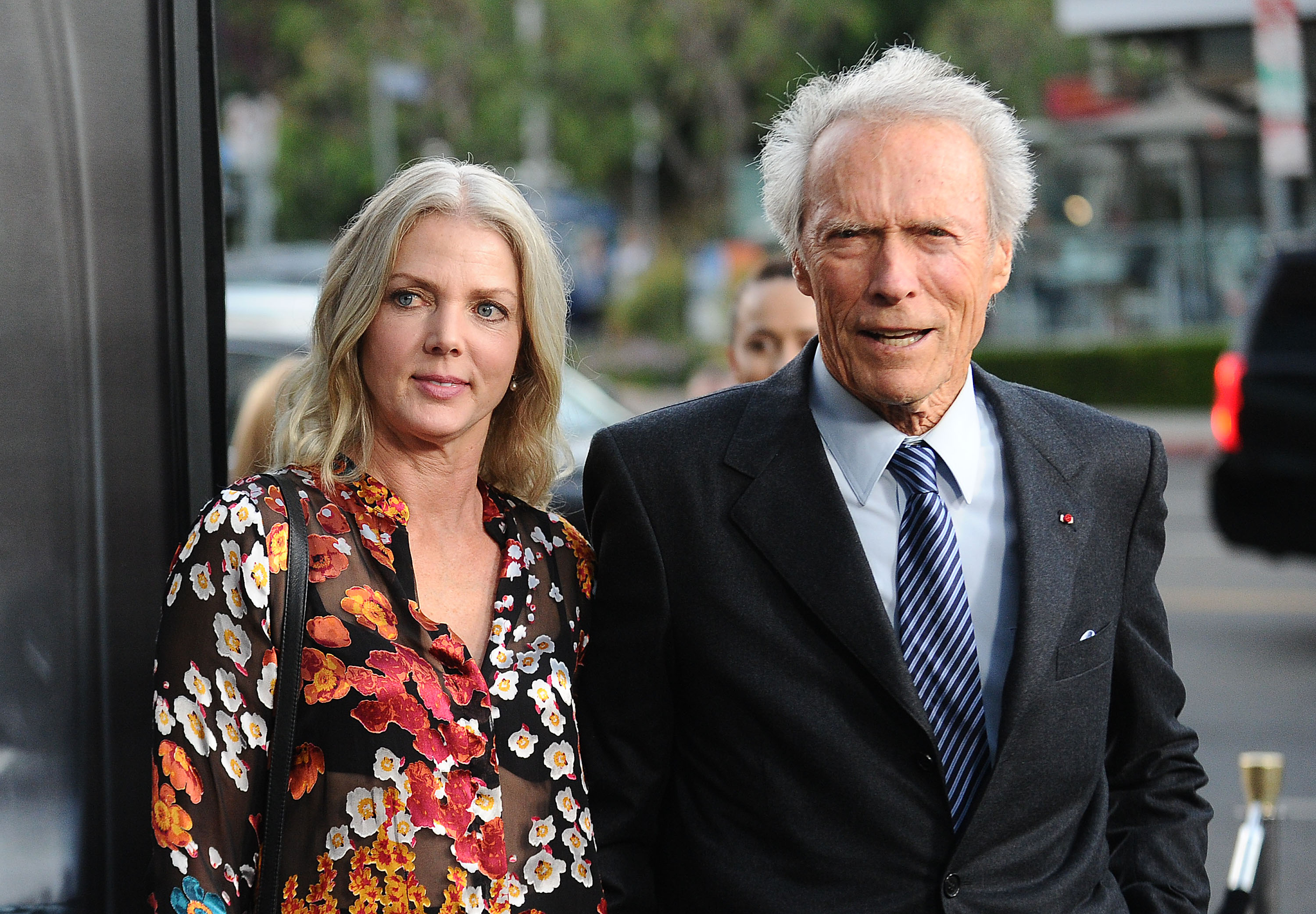 Clint Eastwood and Christina Sandera attend a screening of "Sully" at Directors Guild Of America in Los Angeles, California, on September 8, 2016. | Source: Getty Images
