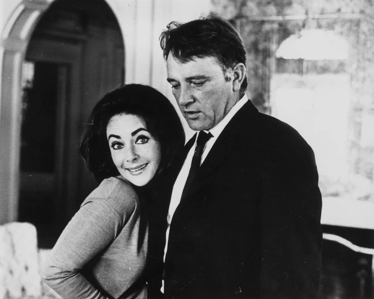 American actress Elizabeth Taylor with husband Welsh actor Richard Burton (1925 - 1984) in Los Angeles in 1963. | Source: Getty Images
