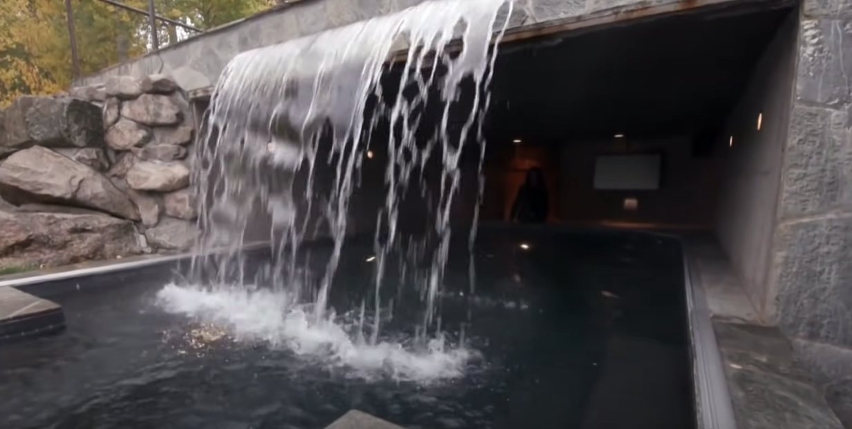 A view of the waterfall from the hot tub jacuzzi | Source: Youtube.com/CNBC Make It 