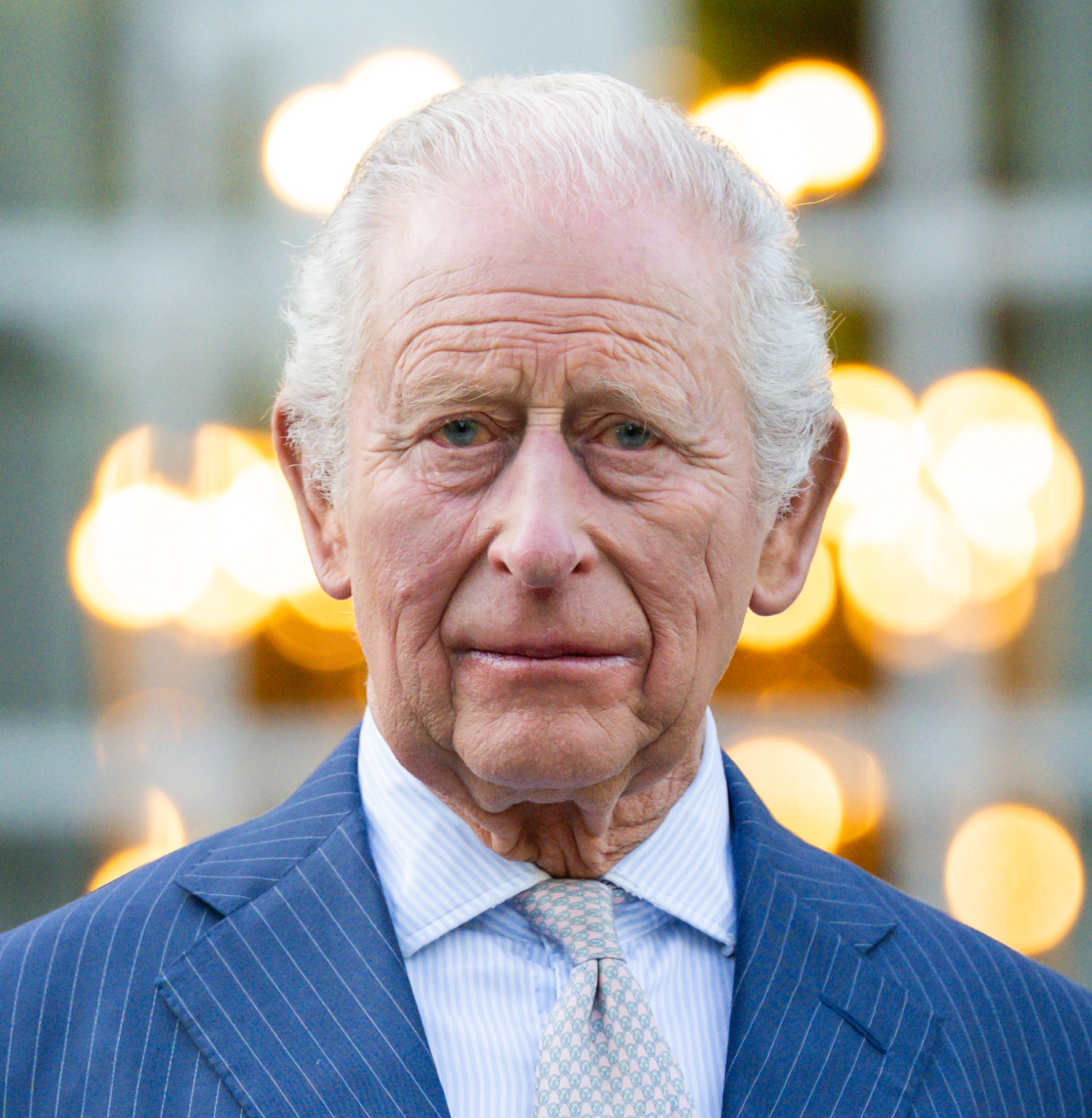 King Charles III was later captured in a close-up portrait during the same garden party, his expression measured and reflective as warm lights from the White House created a soft glow behind him. The intimate frame highlighted the gravity of the moment on day one of the visit, as the monarch balanced ceremonial duties with the symbolic weight of representing the United Kingdom at a landmark moment in U.S. history.