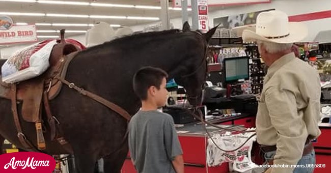 Cowboy takes his horse for a stroll through a store