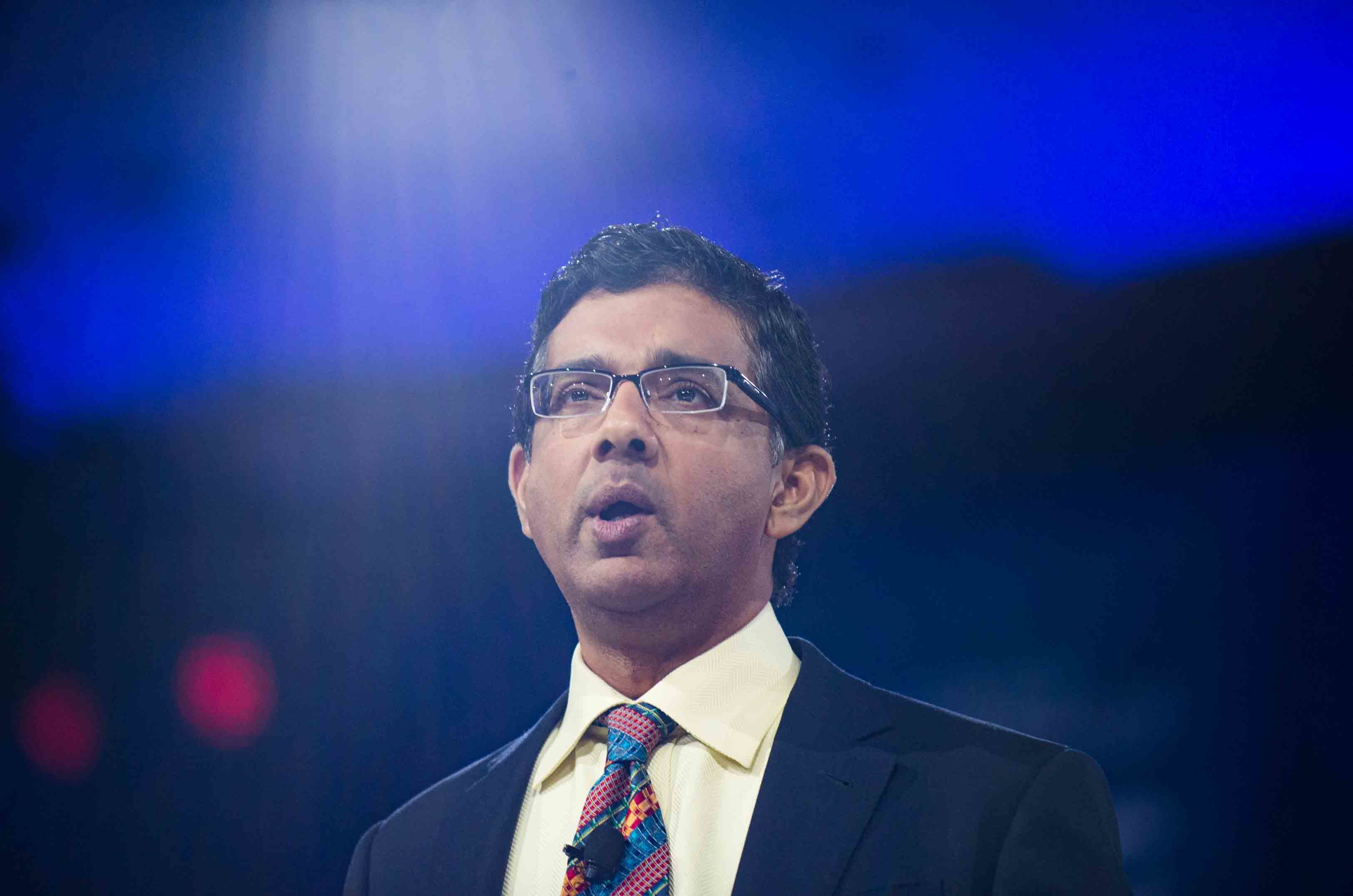 Dinesh D'souza speaking at the CPAC 2016 conference on March 5, 2016, in National Harbor, Maryland. | Source: Getty Images