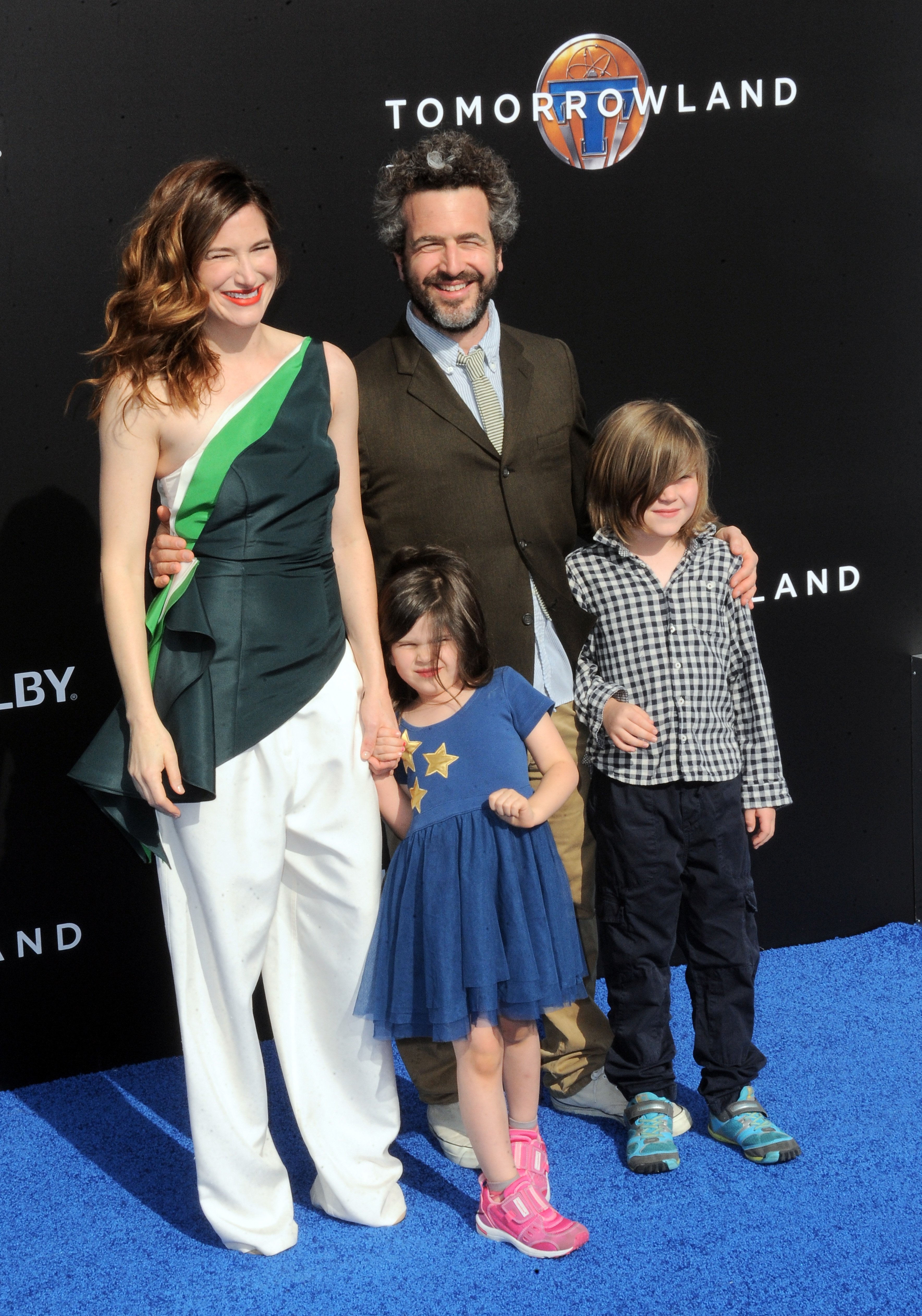 Actress Kathryn Hahn, Ethan Sandler, Leonard Sandler and Mae Sandler arrives for the Premiere Of Disney's "Tomorrowland" held at AMC Downtown Disney 12 Theater on May 9, 2015 in Anaheim, California. | Source: Getty Images