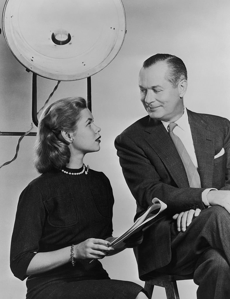 Actor Robert Montgomery on a film set with his daughter, actress Elizabeth Montgomery in 1960 | Photo: Getty Images