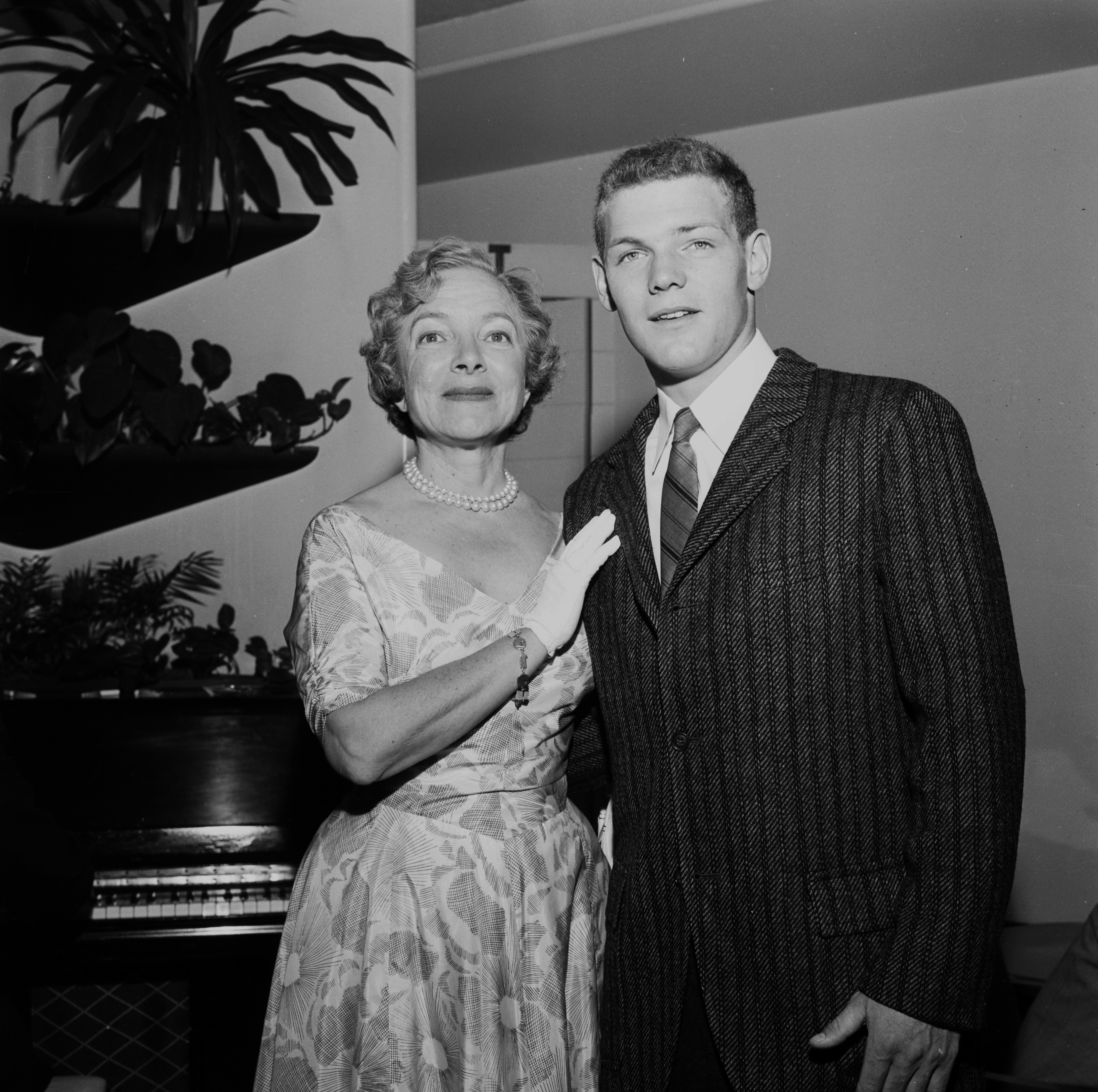 James MacArthur and Helen Hayes at a premiere in Los Angeles circa 1956 | Source: Getty Images