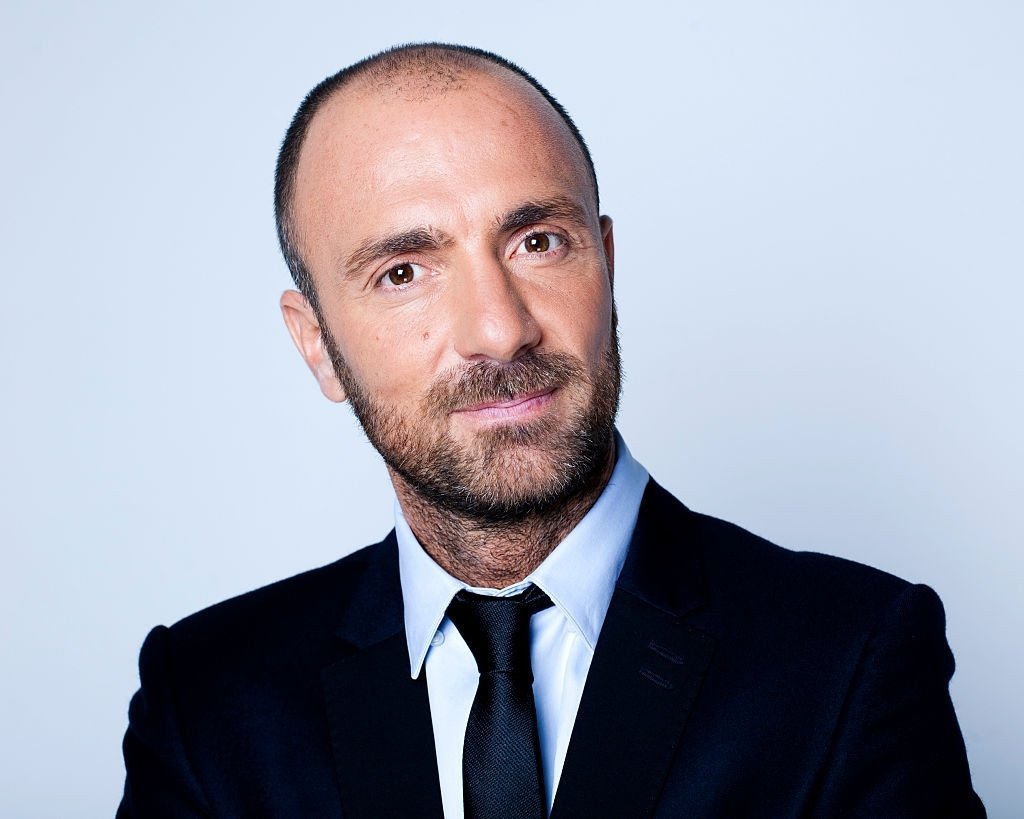 PARIS, FRANCE - 27 SEPTEMBRE : Le journaliste sportif Christophe Dugarry pose lors d'une séance photo le 27 septembre 2016 à Boulogne Billancourt, Paris, France. | Photo : Getty Images