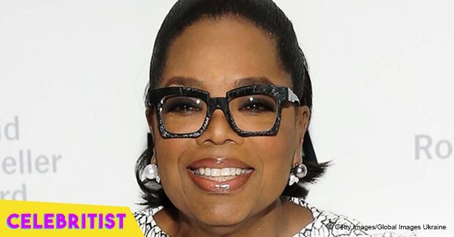 Oprah flaunts her curvy figure in low-cut green gown after dramatic weight loss