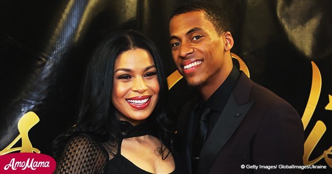 Jordin Sparks shares a touching photo with her hubby while he cradles her enormous baby bump