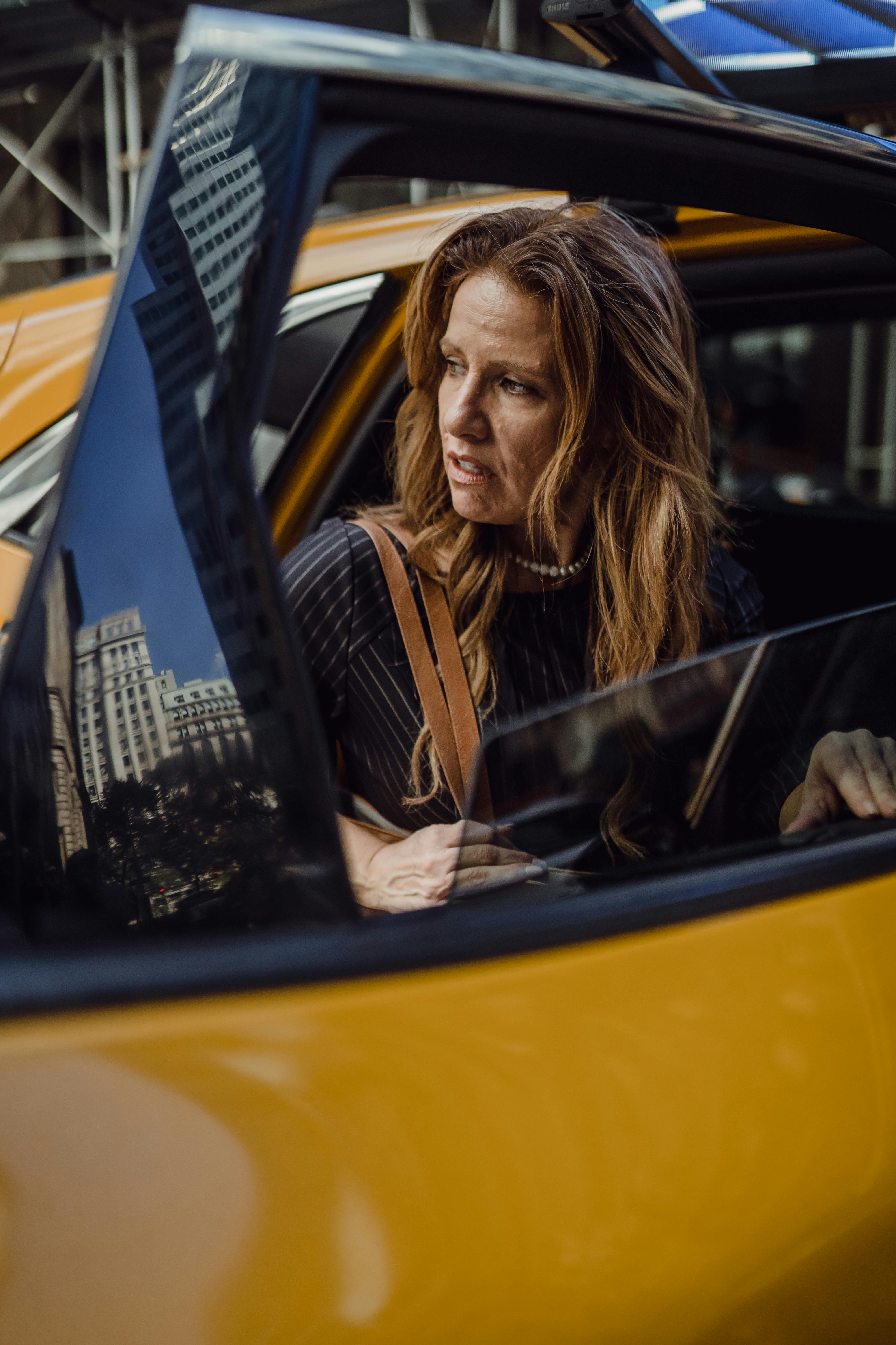 A woman getting out of car | Source: Pexels