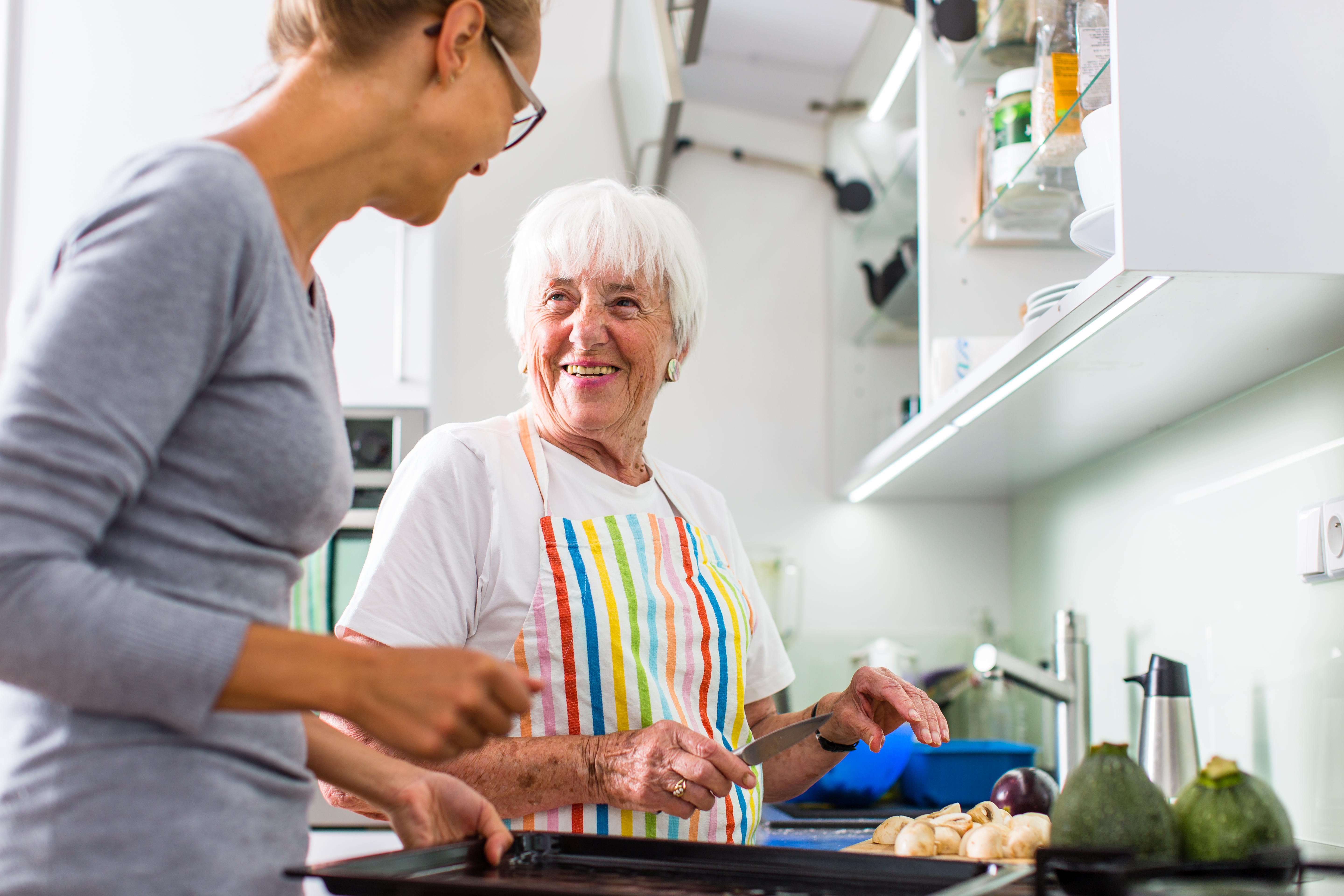 Senior woman/grandmother cooking | Source: Shutterstock