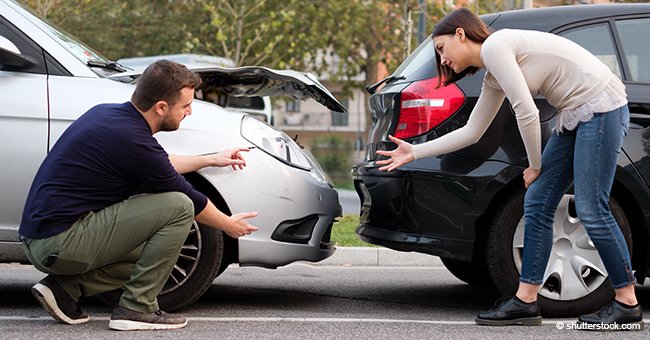 A woman and a man are involved in a car accident