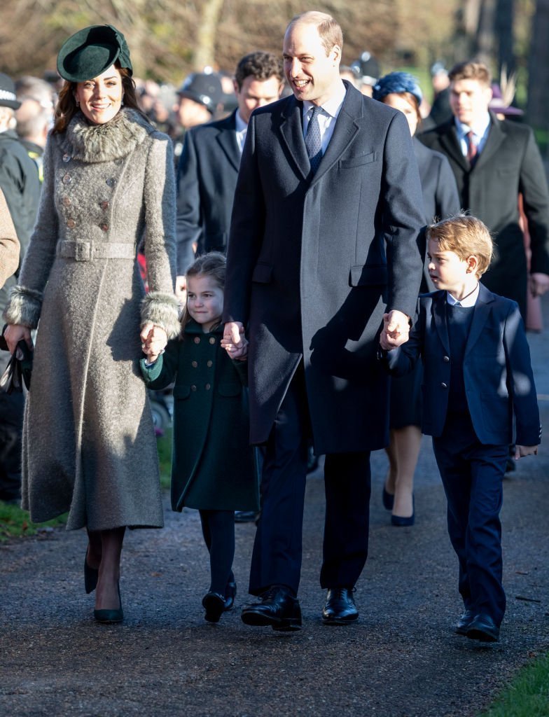 Prince William, Duke of Cambridge and Catherine, Duchess of Cambridge with Prince George of Cambridge and Princess Charlotte of Cambridge attend the Christmas Day Church service at Church of St Mary Magdalene on the Sandringham estate | Photo: Getty Images
