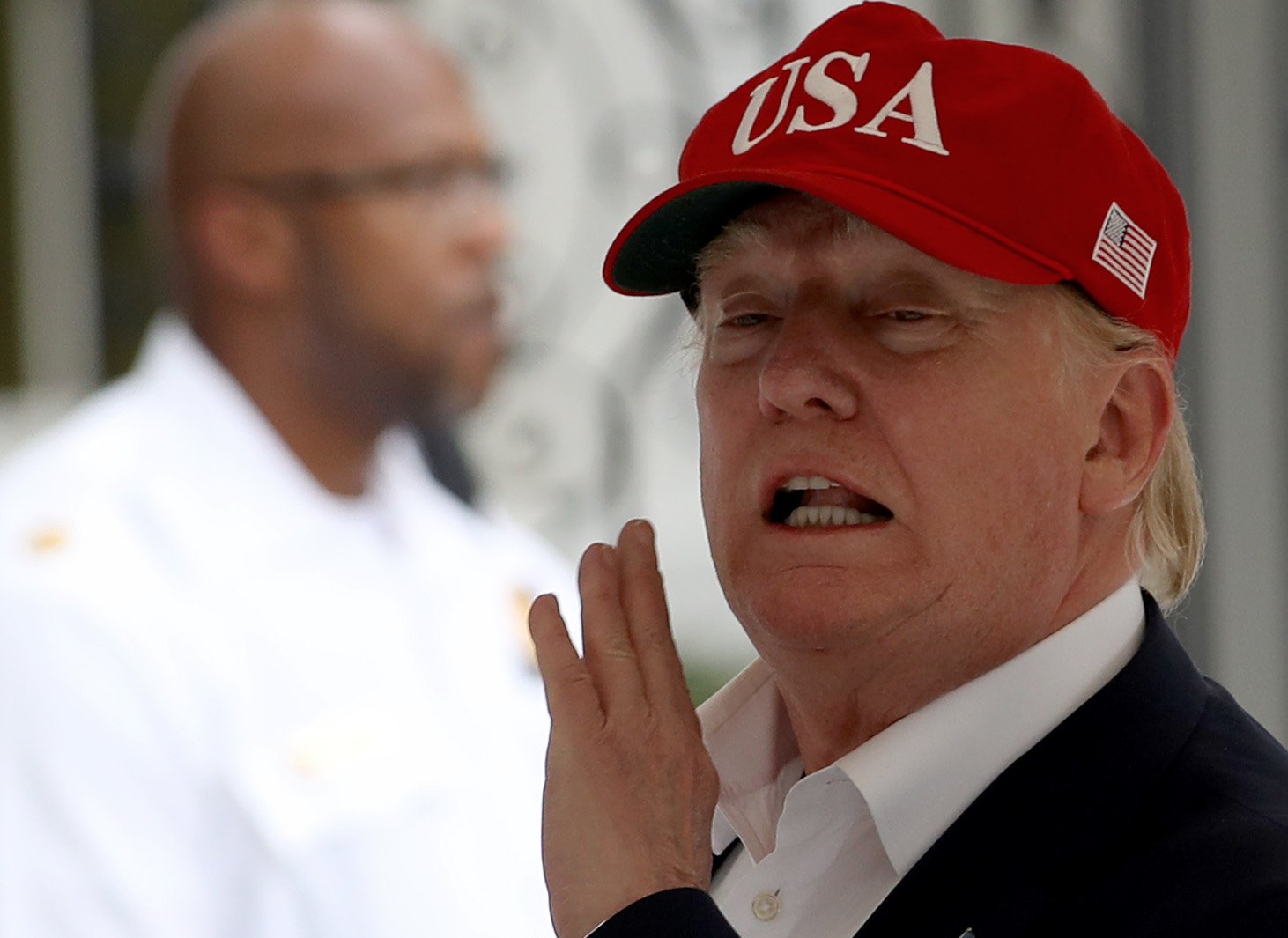 Donald Trump addressing reporters as he returns to the White House in Washington, DC | Photo: Getty Images