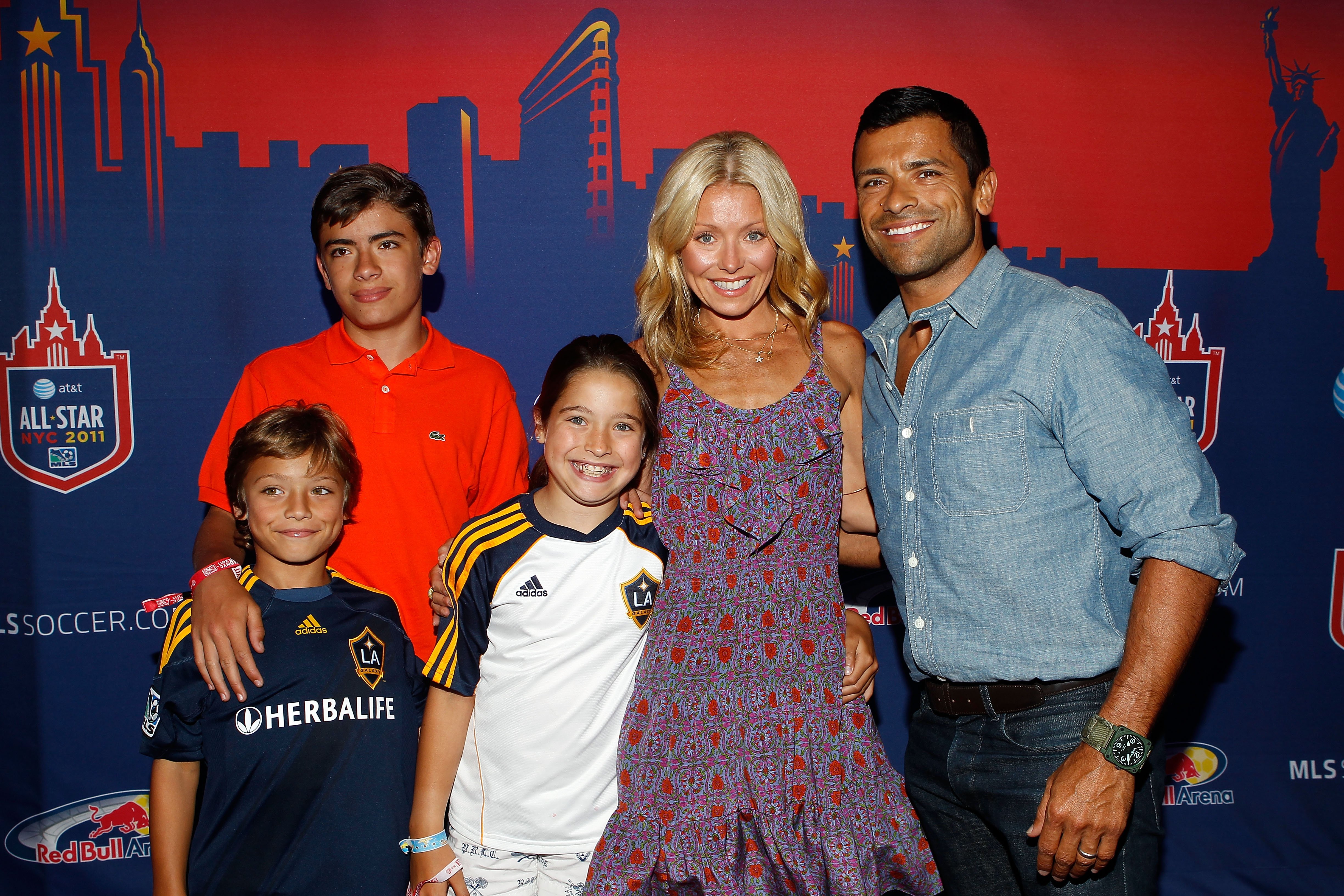 Kelly Ripa (2nd R), her husband Mark Consuelos (R) and their kids smiles for a photo prior to the MLS All-Star Game at Red Bull Arena on July 27, 2011 in Harrison, New Jersey. | Source: Getty Images