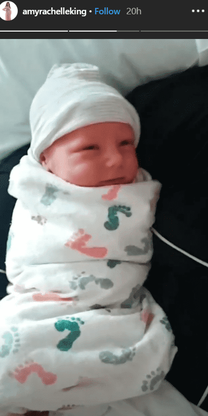 Photo of baby Daxton King squinting | Source: Instagram/@amyrachelleking