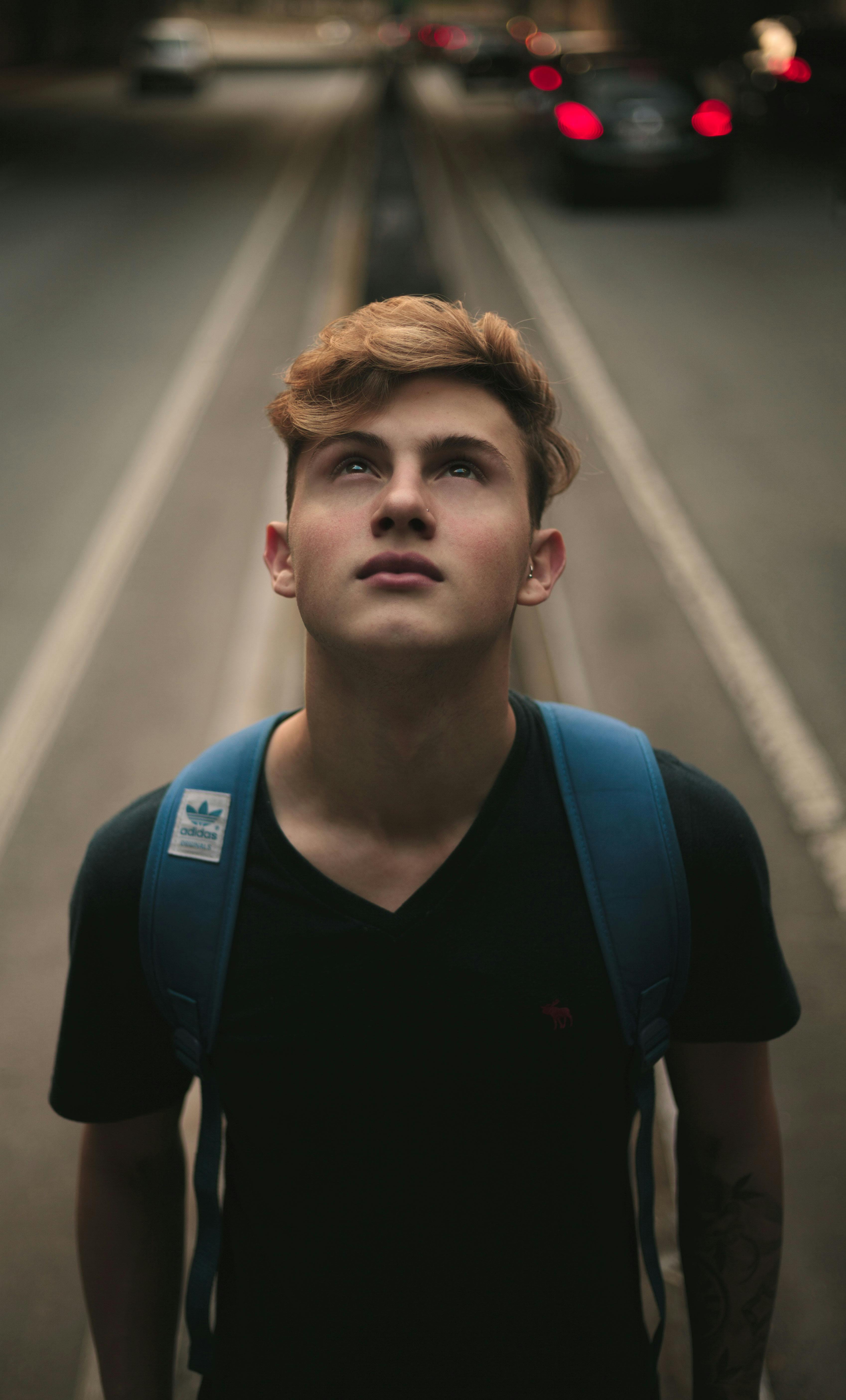 Teen boy on the road | Source: Pexels