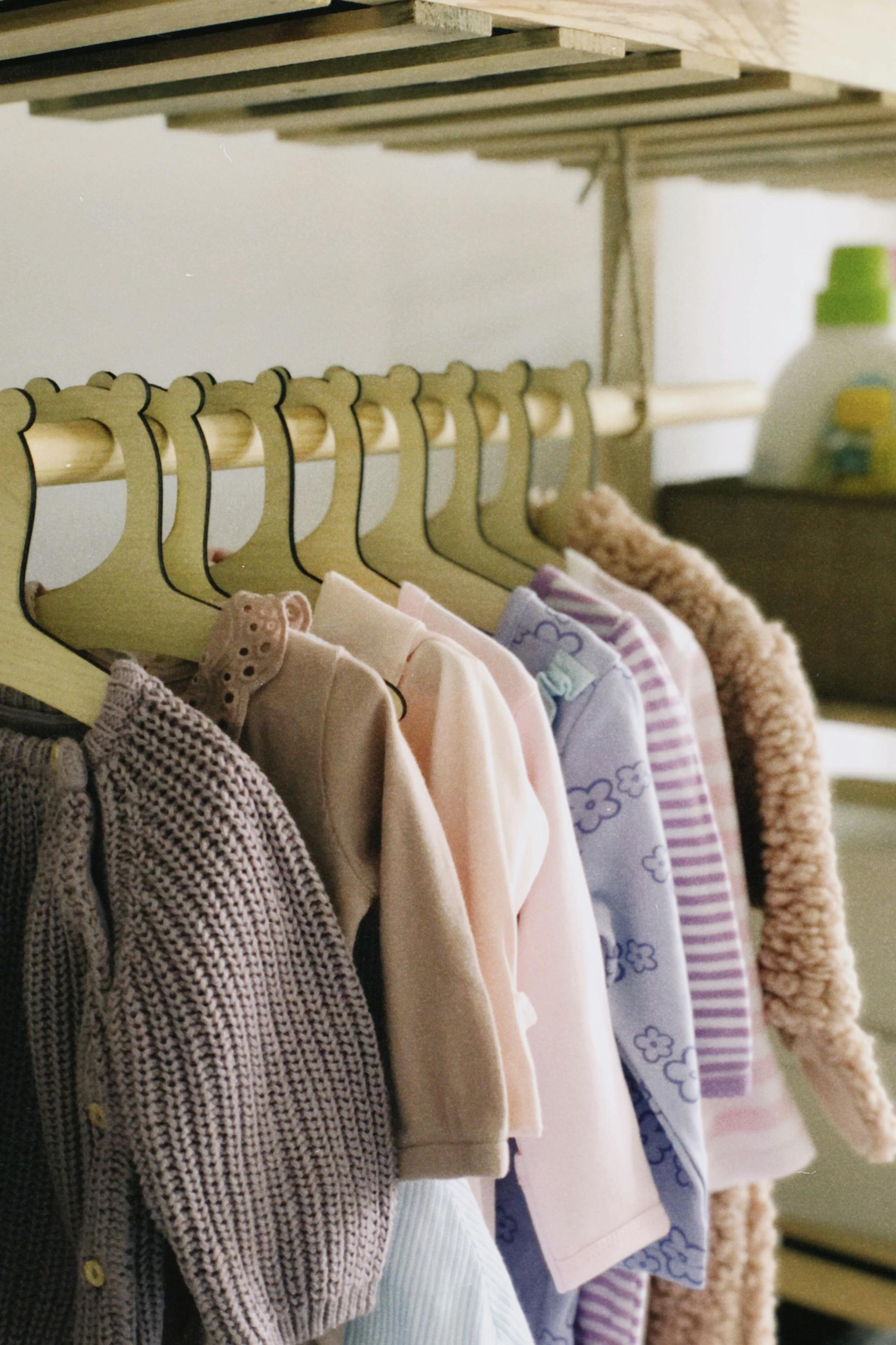 A child's clothes in a wardrobe | Source: Pexels