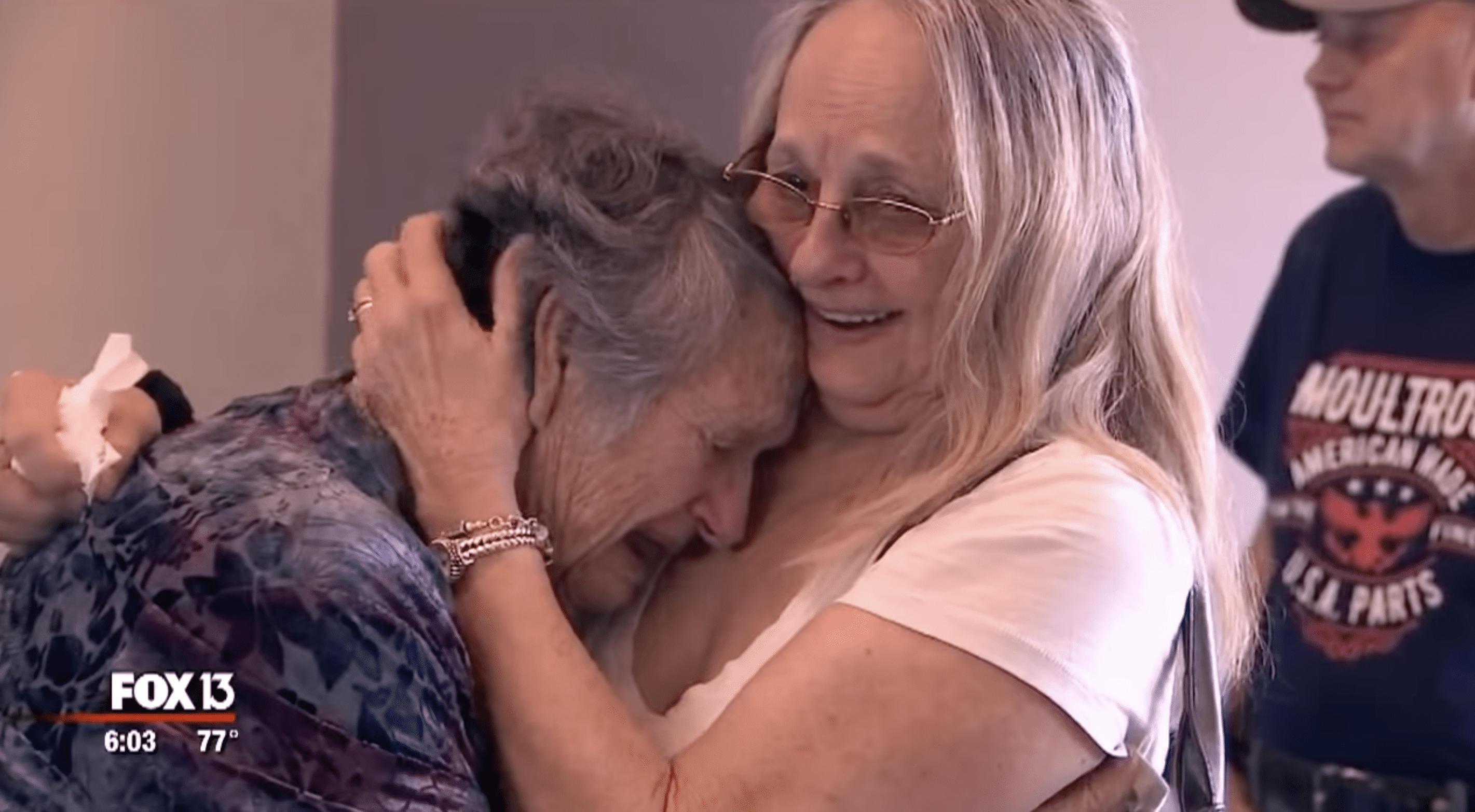 Purinton and Moultroup share a warm hug after years of separation. | Photo: youtube.com/FOX 13 Tampa Bay