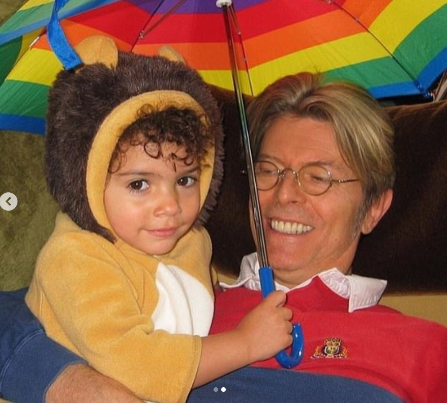 Alexandra Jones with her dad David Bowie as seen in a carousel post dated January 11, 2023 | Source: Instagram/ _p0odle_