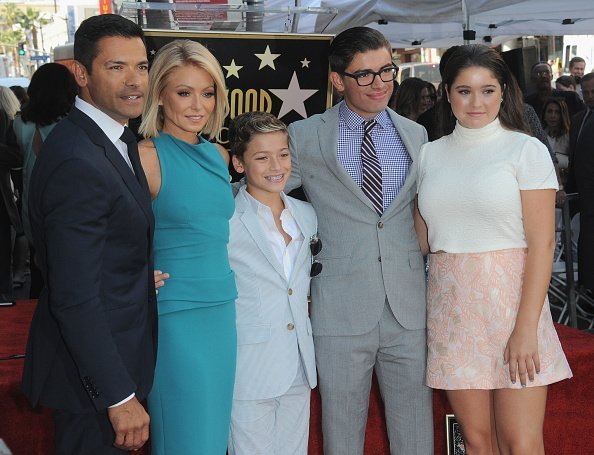  Mark Consuelos, Kelly Ripa, Joaquin Consuelos, Michael Consuelos and Lola Consuelos at the Kelly Ripa Star Ceremony on The Hollywood Walk Of Fame | Photo: Getty Images