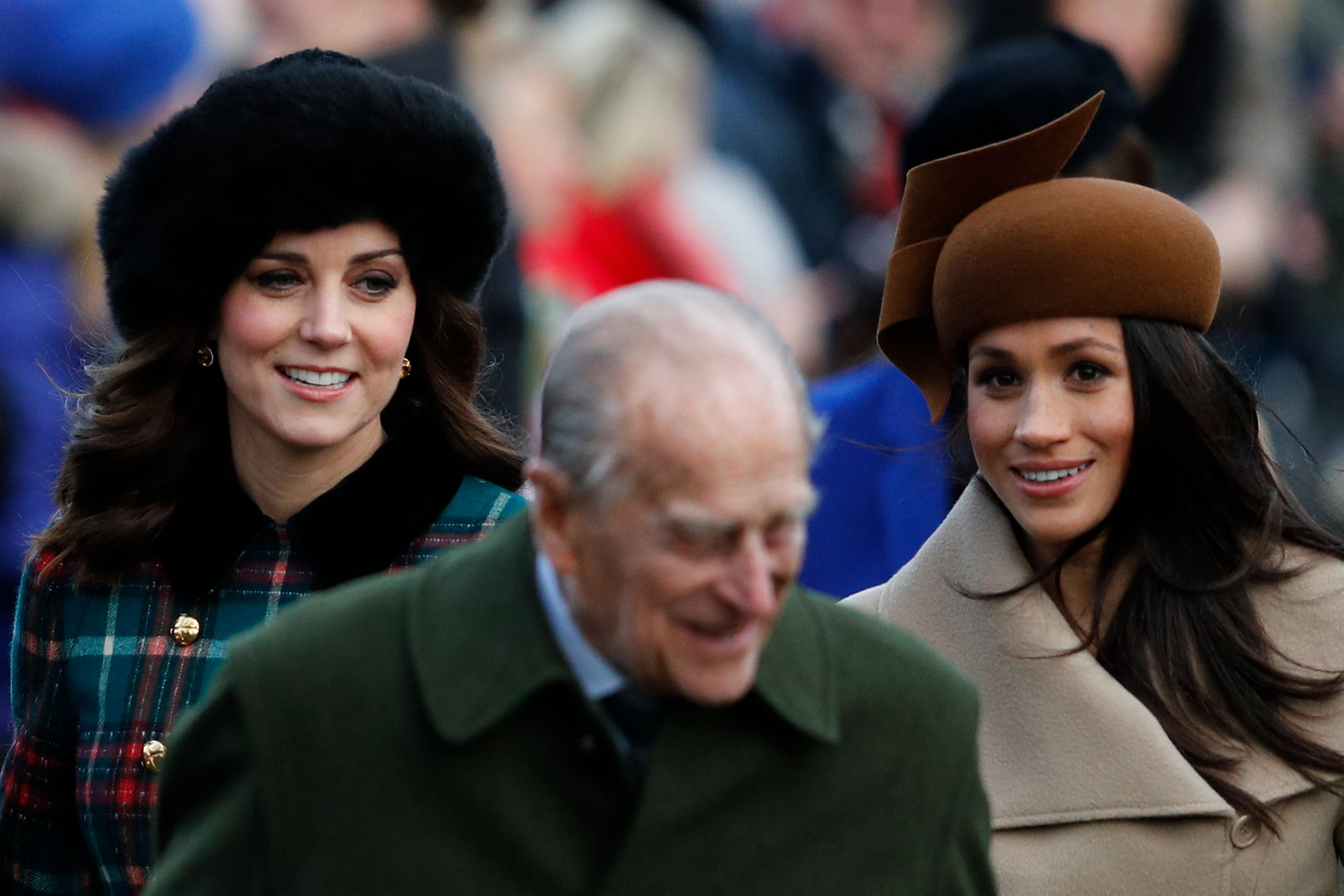 Duchess Kate, Prince Philip, and Meghan Markle at the Royal Family's traditional Christmas Day church service in Sandringham, Norfolk, on December 25, 2017. | Source: Getty Images