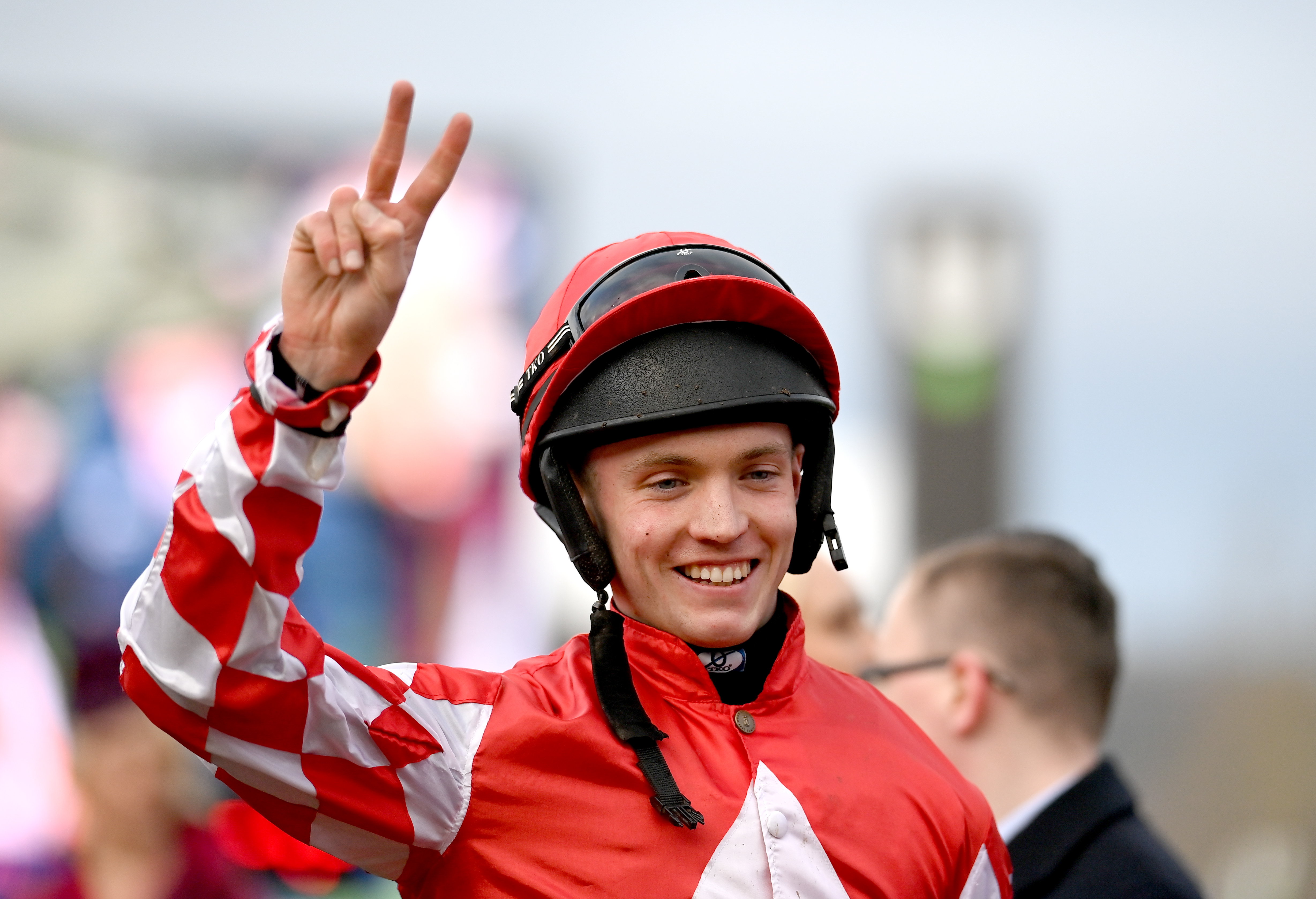 Jockey Michael O'Sullivan, celebrates his second win, after winning the Boodles Juvenile Handicap Hurdle Chase during day one of the Cheltenham Racing Festival at Prestbury Park in Cheltenham, England, on March 14, 2023 | Source: Getty Images