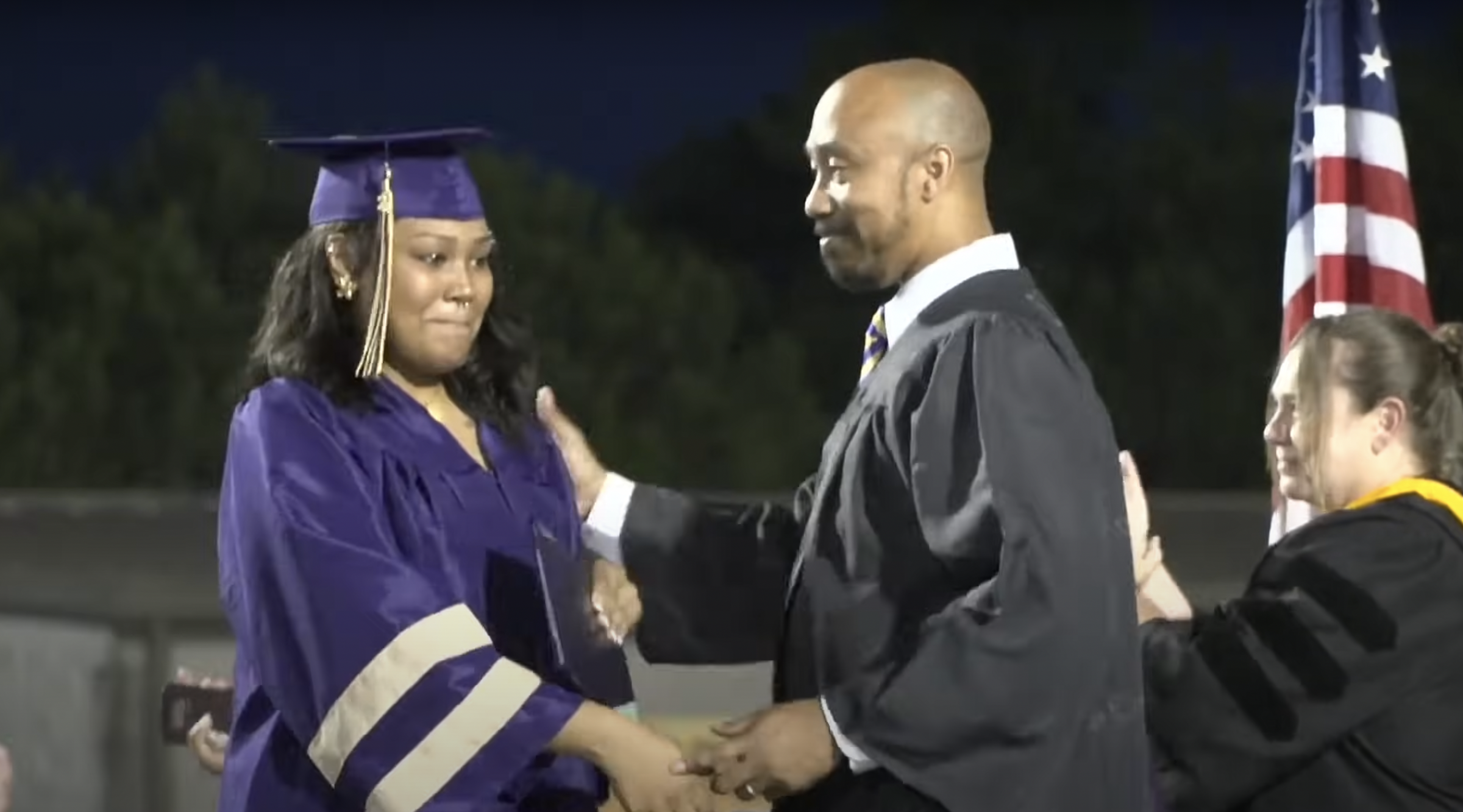 Sienna Stewart receiving her high school diploma, as seen in a video dated May 23, 2024 | Source: YouTube/HiramHighSchool