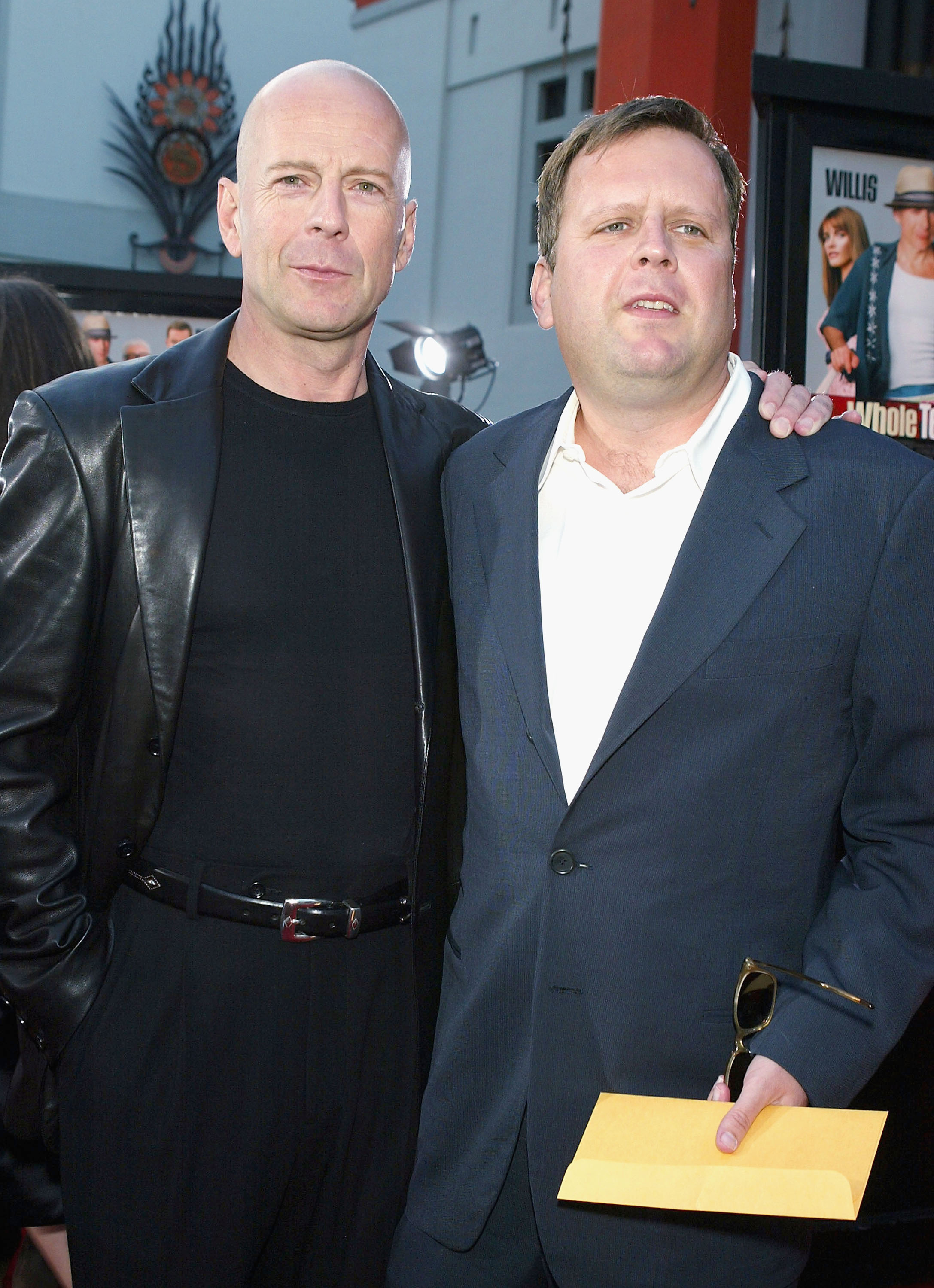 Bruce Willis and David Willis pose at the Chinese Theater on April 7, 2004, in Hollywood, California. | Source: Getty Images