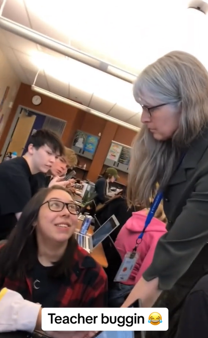 A teacher having a confrontation with a student in her class in a TikTok video uploaded on January 7, 2024 | Source: TikTok/specere