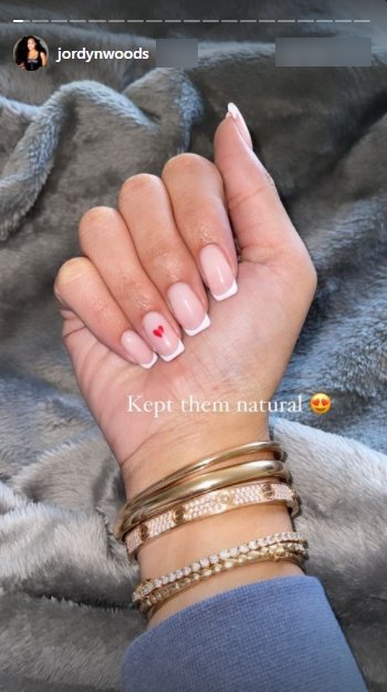 A picture of Jordyn Woods showing off her nails and expensive bracelets. | Photo: Jordynwoods