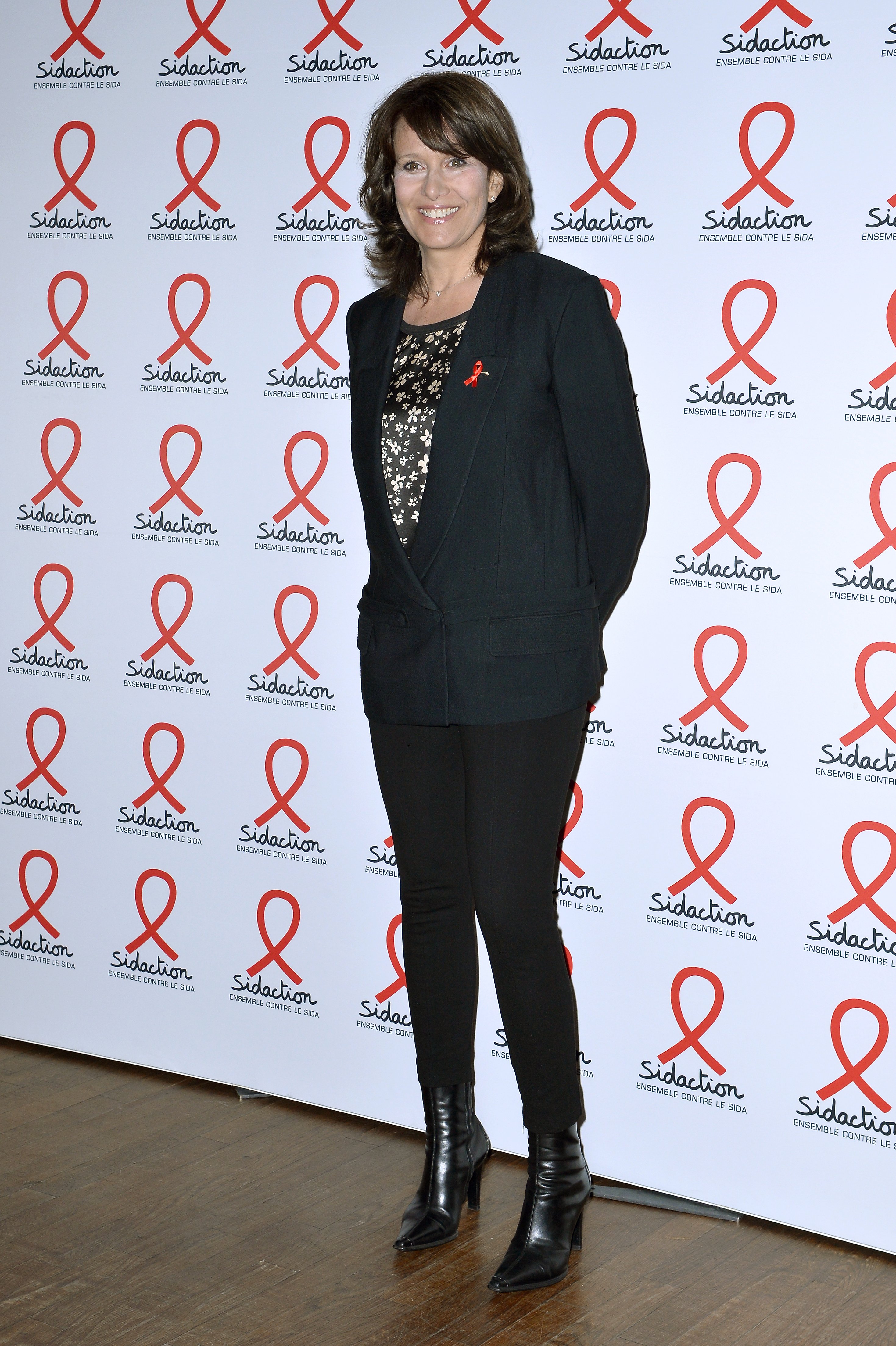 Carole Rousseau assiste à la photocall du Sidaction 2019 à la Salle Wagram le 18 mars 2019 à Paris, France. | Photo : Getty Images