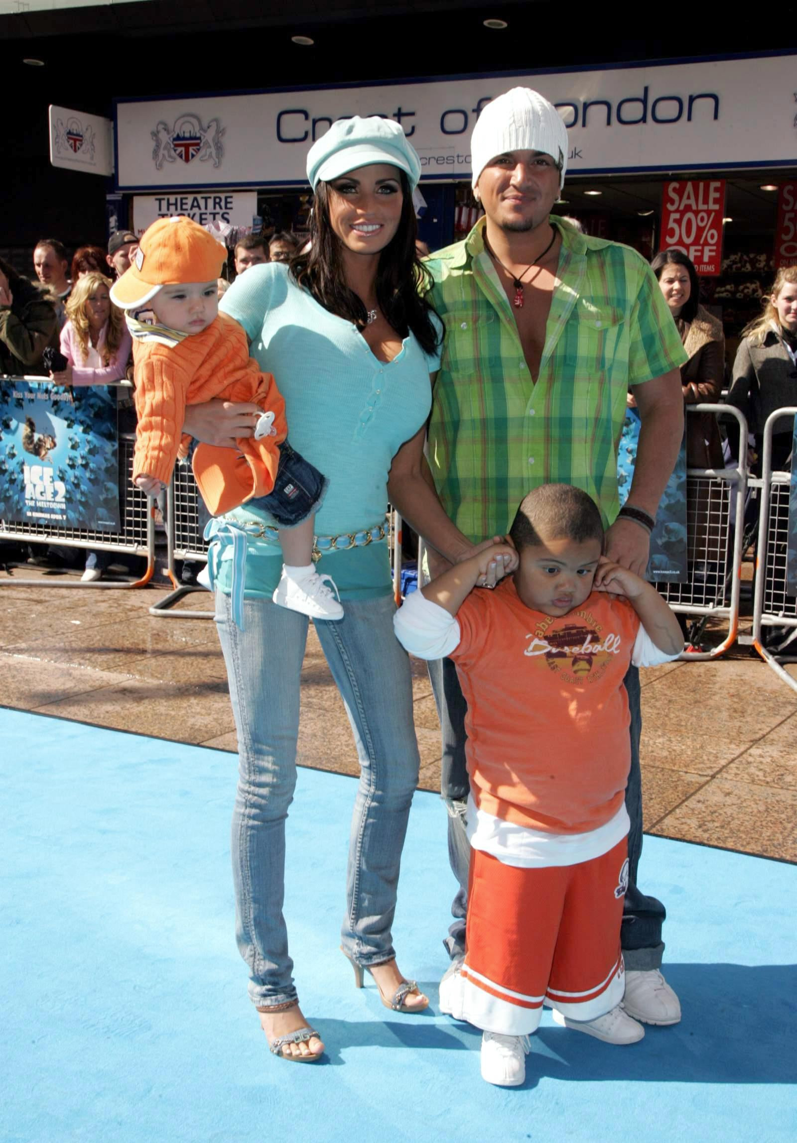 Katie Price and Peter Andre pose on the blue carpet with their children, Harvey Price and Junior Andre, at the London premiere of "Ice Age 2" on April 2, 2006. With Harvey covering his ears in response to the crowd noise, the candid moment offered a glimpse into the sensory sensitivities he navigated even as a young child.