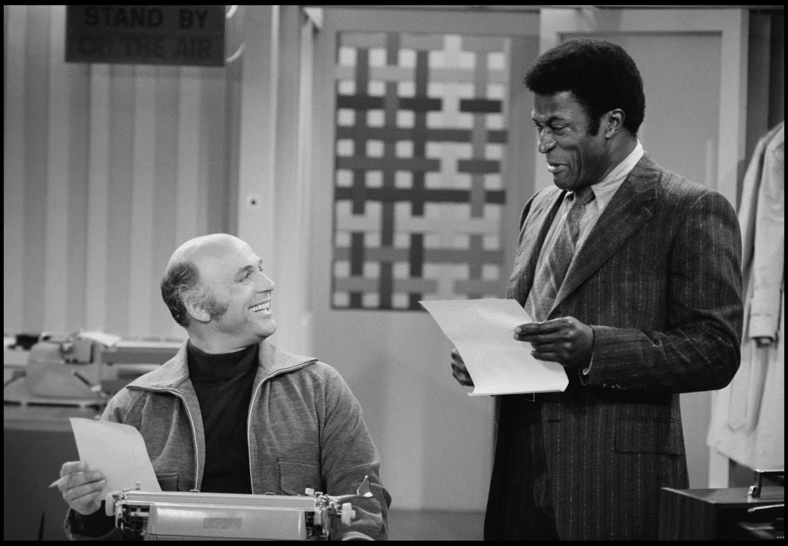 Gavin MacLeod as Murray Slaughter and John Amos as Gordon Howard on "The Mary Tyler Moore Show," circa 1972. | Source: Getty Images