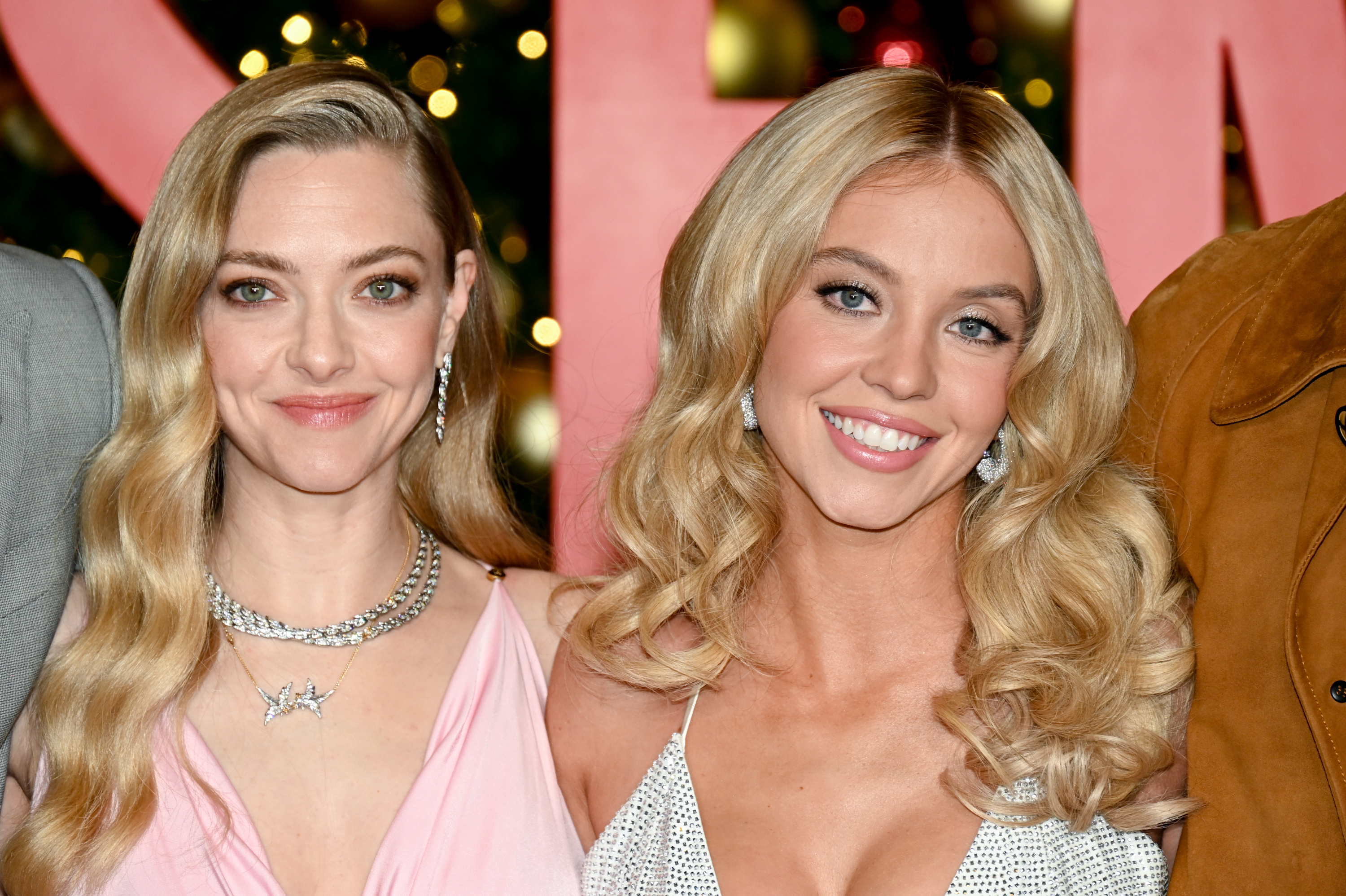 A close-up of Amanda Seyfried and Sydney Sweeney as they stand shoulder to shoulder, their glowing complexions and coordinated glam drawing praise across social media.