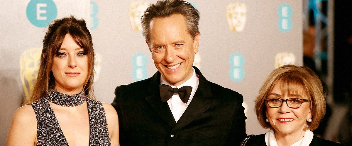 Richard E. Grant on the red carpet with his wife Joan Washington (R) at the BAFTA British Academy Film Awards on February 10, 2019 | Photo: Getty Images