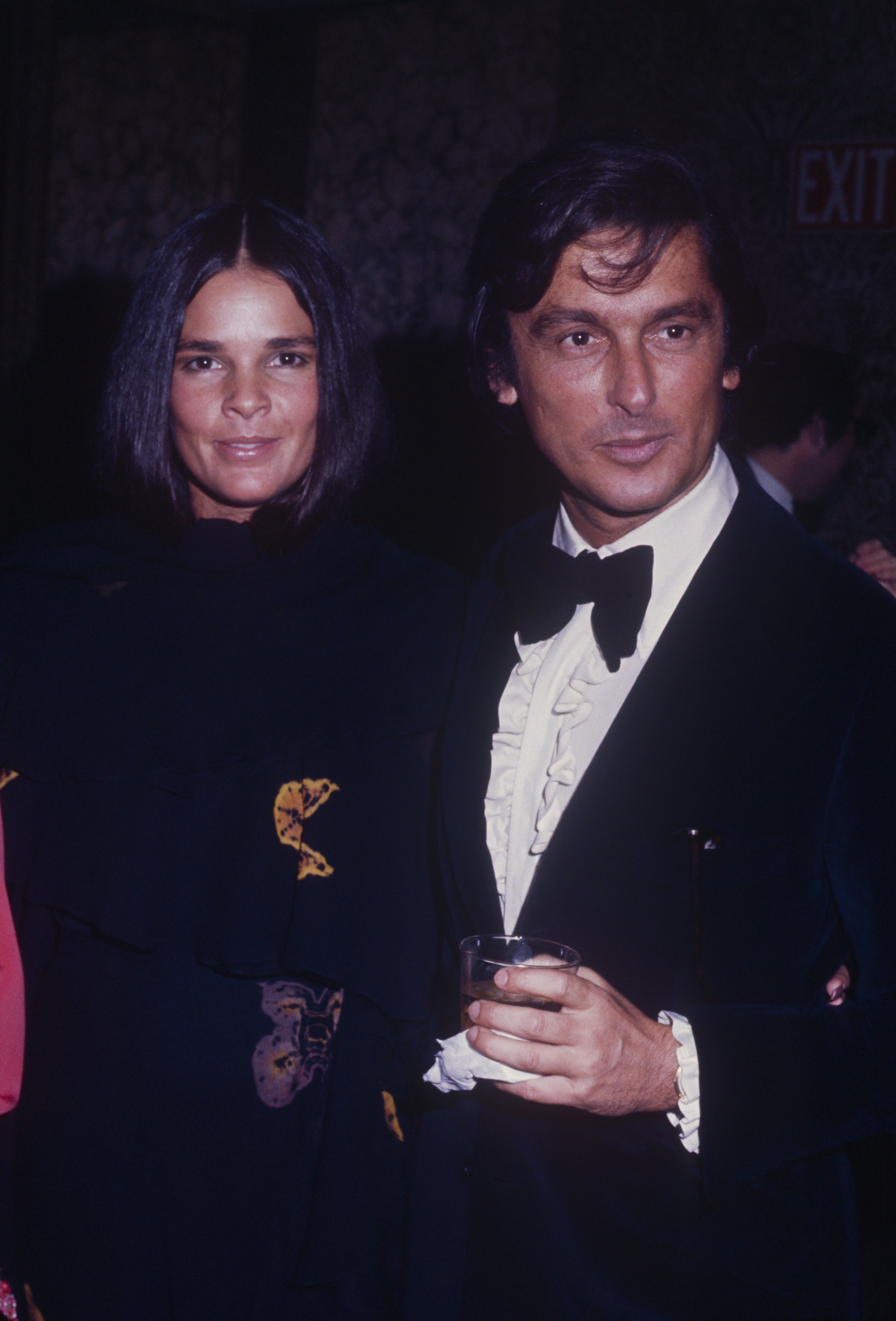 Film producer Robert Evans with his wife activist Ali McGraw during a formal event in 1970, New York. | Source: Getty Images