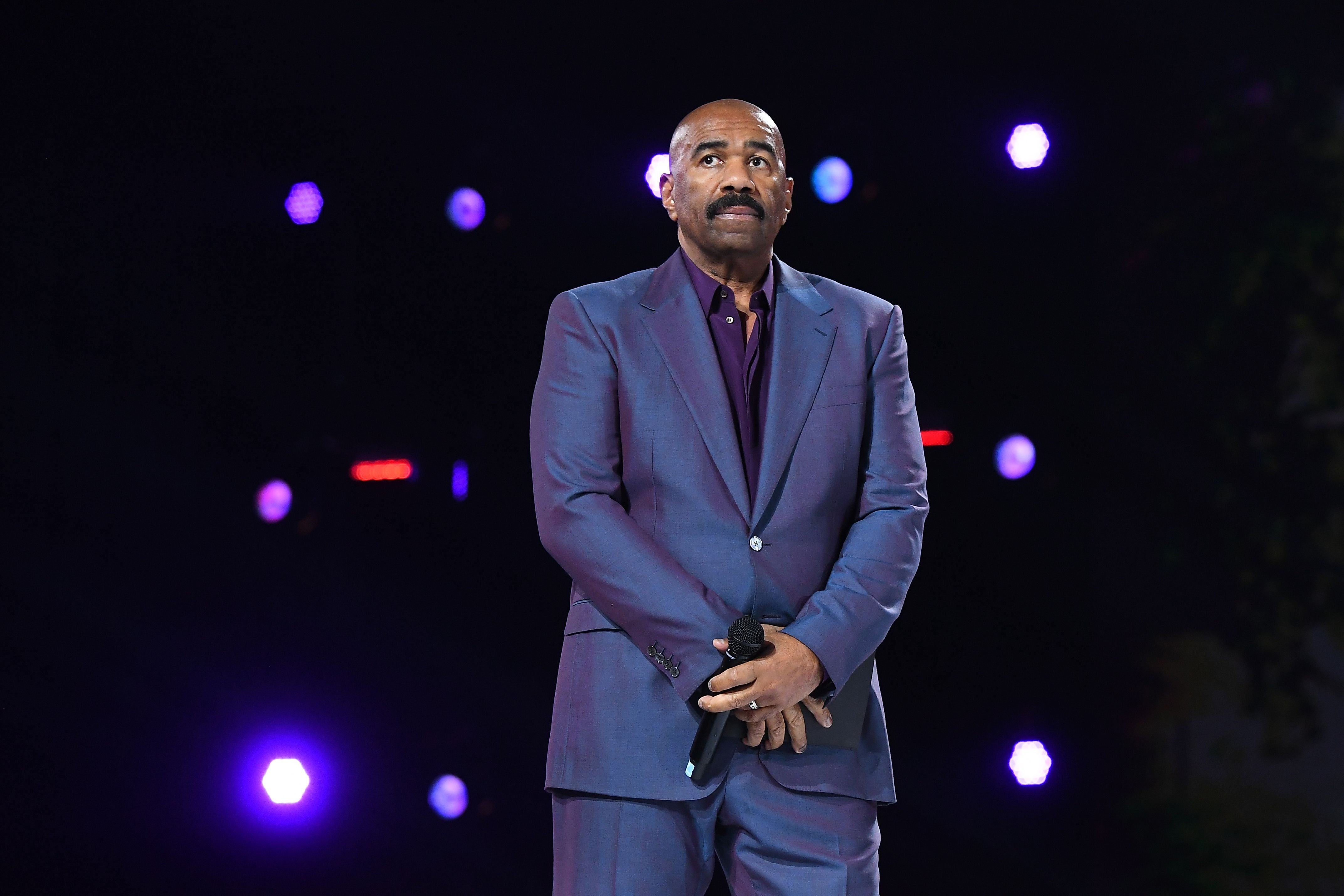"Famiy Feud" host Steve Harvey onstage during the Beloved Benefit at Mercedes-Benz Stadium in Atlanta, Georgia | Photo: Getty Images