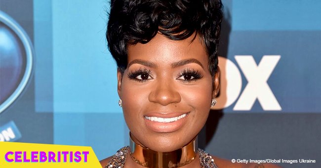 Fantasia Barrino's baby grandson melts hearts in plaid shirt with bowtie in pic with mom & dad