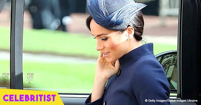 Meghan Markle stuns in navy Givenchy dress and coat at Princess Eugenie's wedding