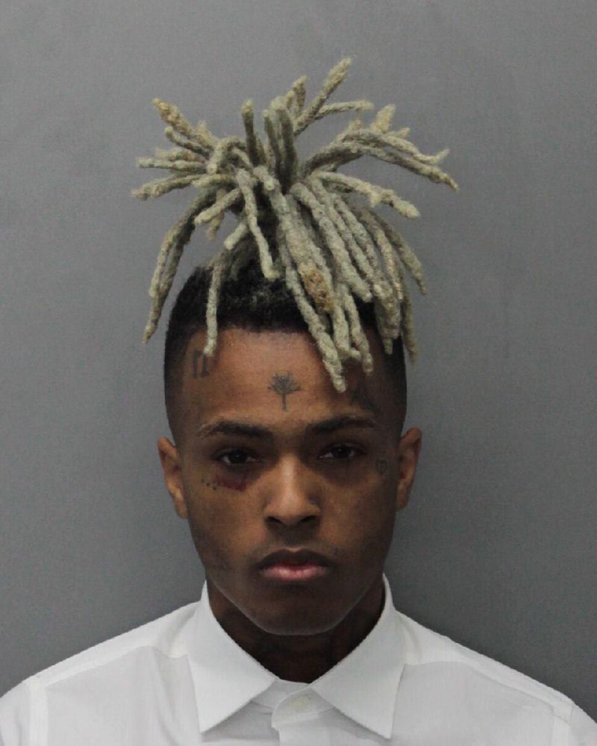 XXXTentacion's mug shot after being charged with seven felonies stemming from a 2016 domestic violence case. | Source: Getty