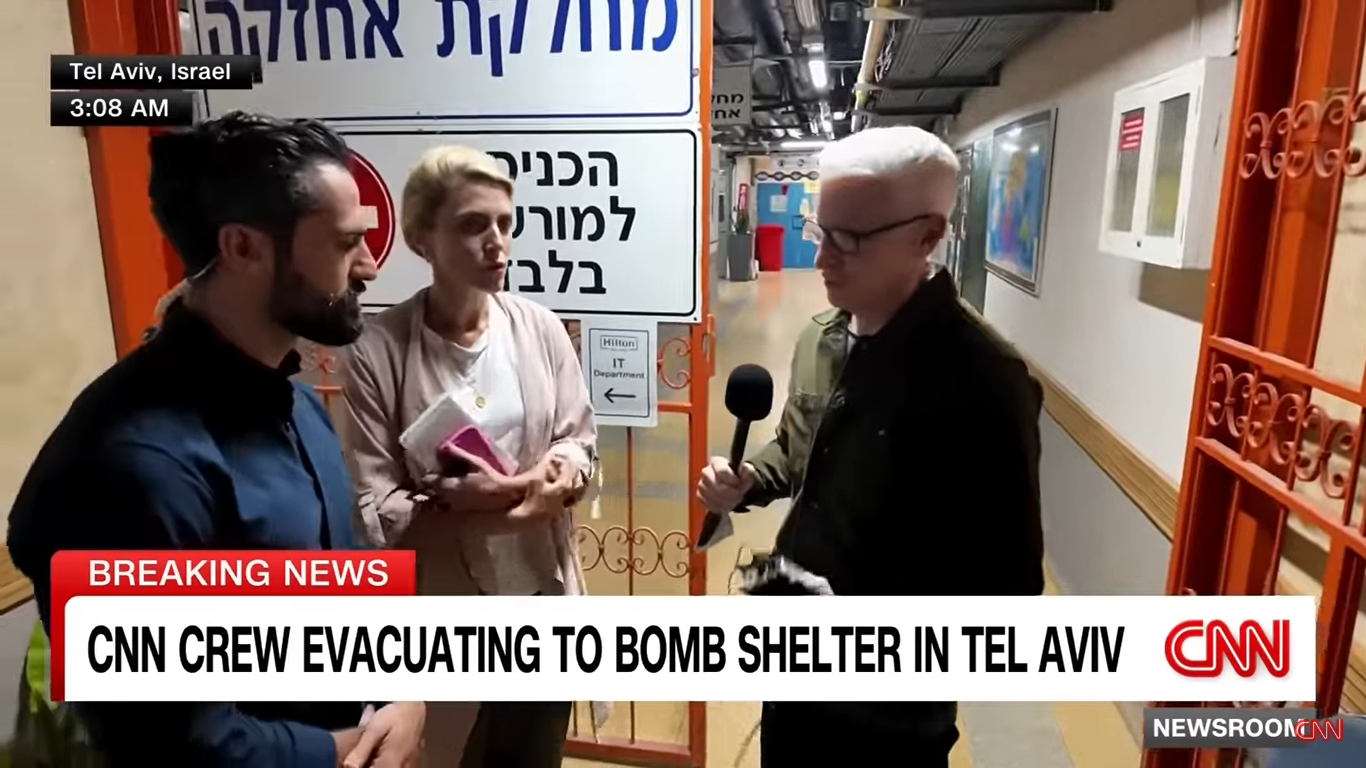 Jeremy Diamond, Clarissa Ward, and Anderson Cooper inside a bomb shelter on June 23, 2025, in Tel Aviv, Israel. | Source: YouTube/CNN